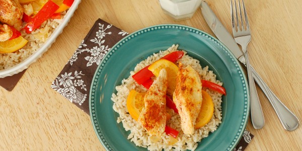 Sweet and Spicy Chicken Over Rice Recipe I www.a-kitchen-addiction.com