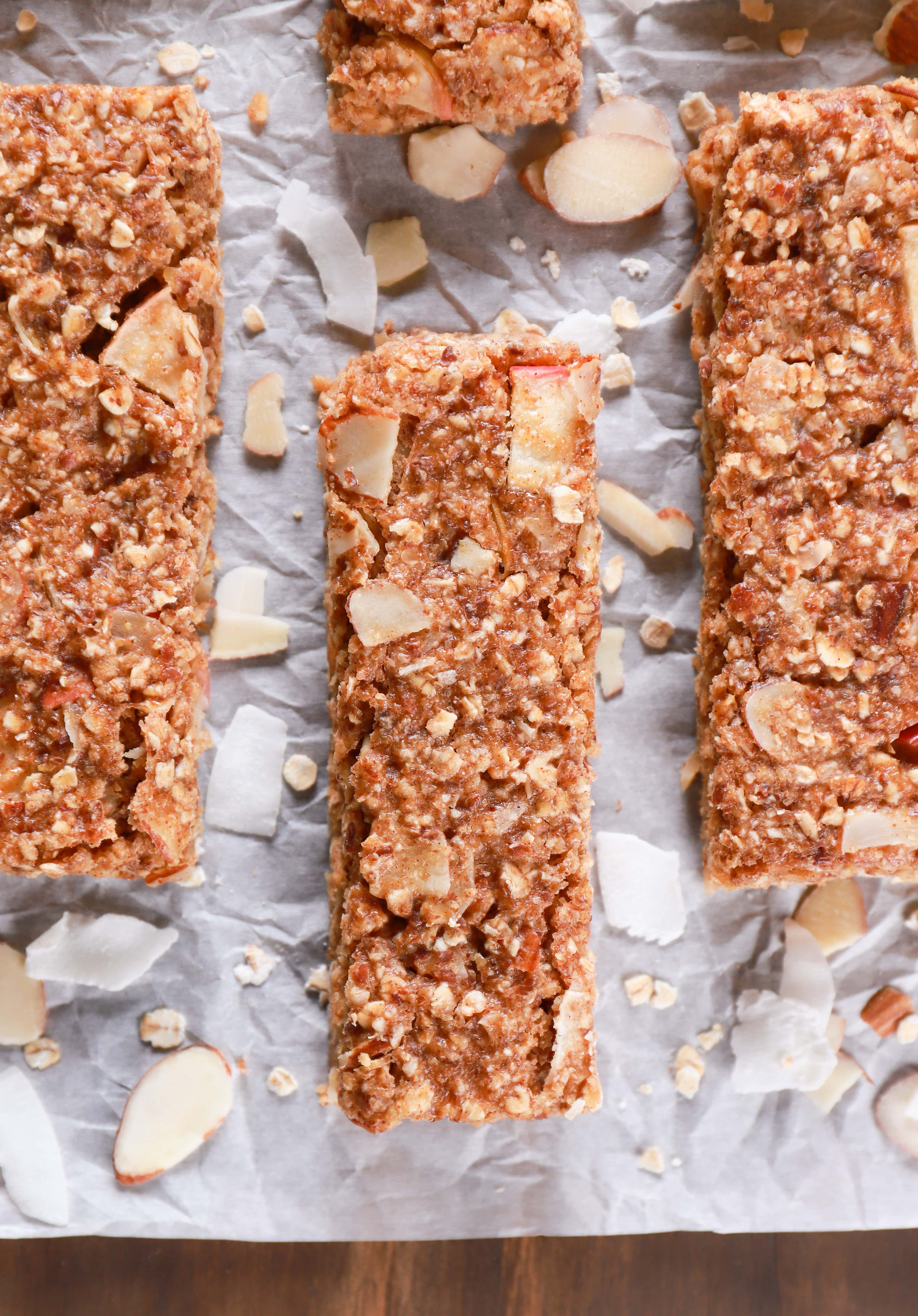 Pan of healthy soft baked apple almond granola bars. Recipe from A Kitchen Addiction