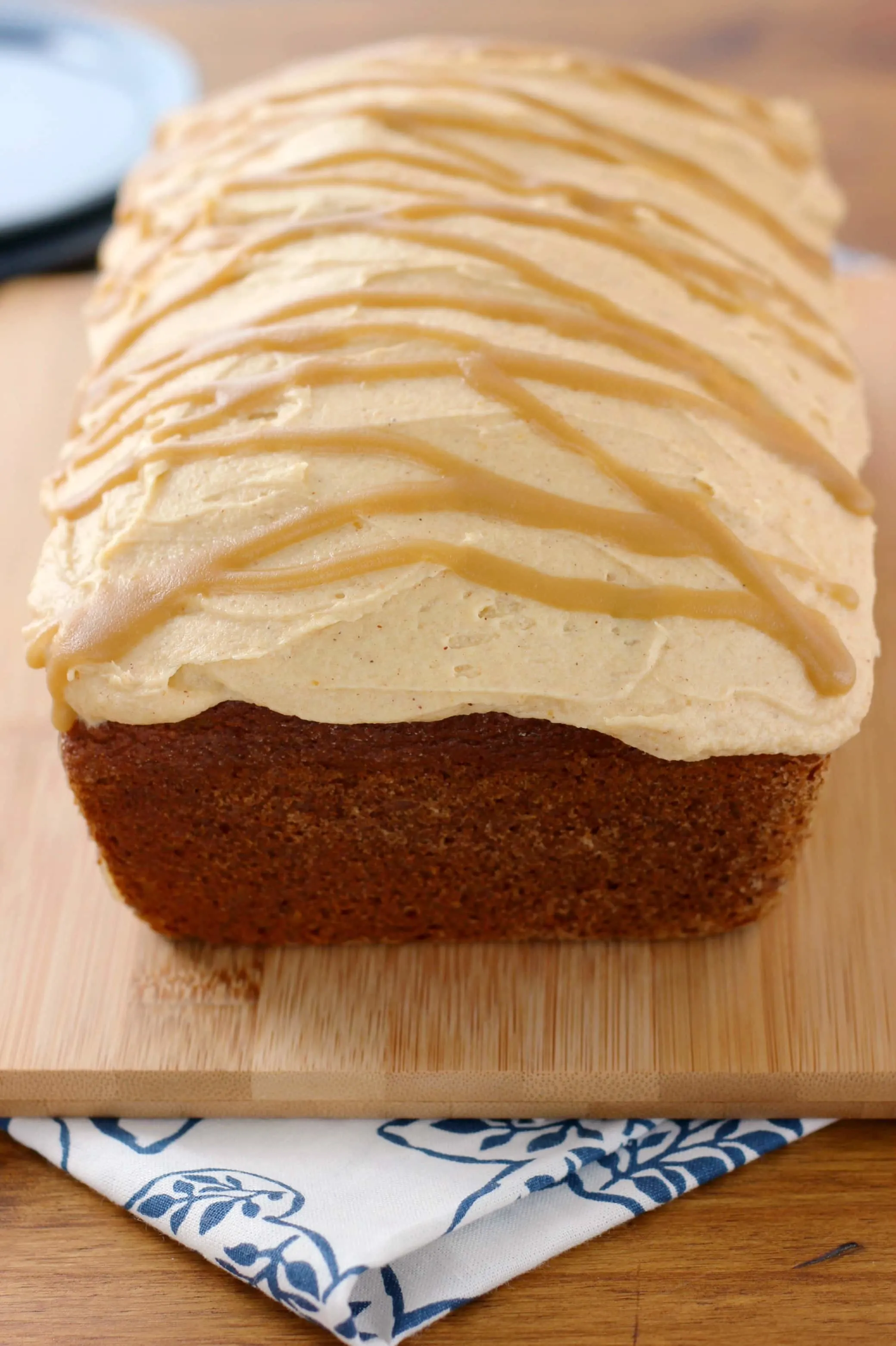 Salted Caramel Drizzled Pumpkin Buttercream Frosted Pumpkin Bread Recipe from A Kitchen Addiction