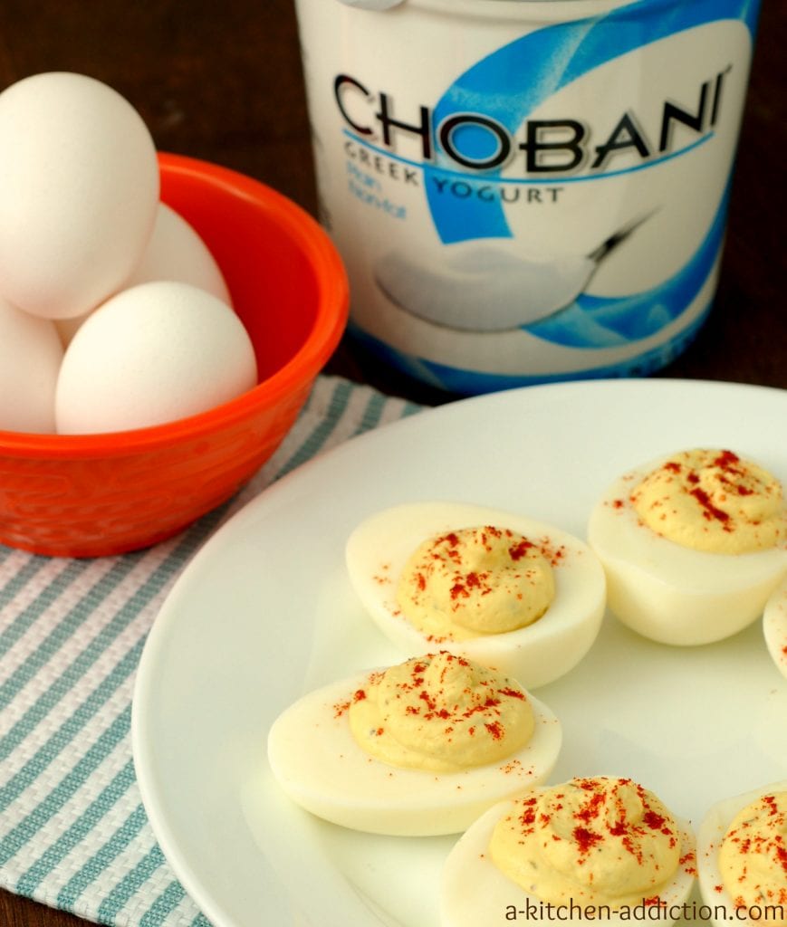 https://www.a-kitchen-addiction.com/wp-content/uploads/2013/03/lightened-up-deviled-eggs-w-name-869x1024.jpg