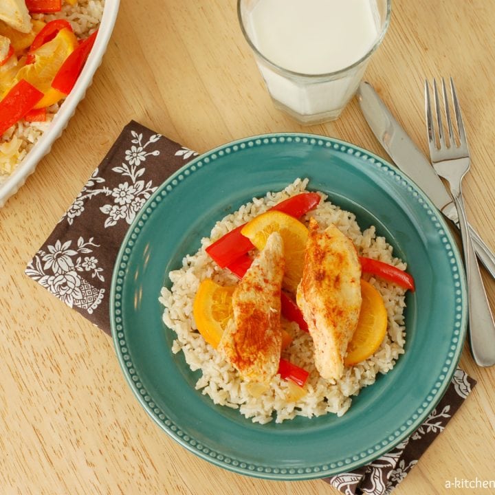 Sweet and Spicy Chicken Over Rice Recipe I www.a-kitchen-addiction.com