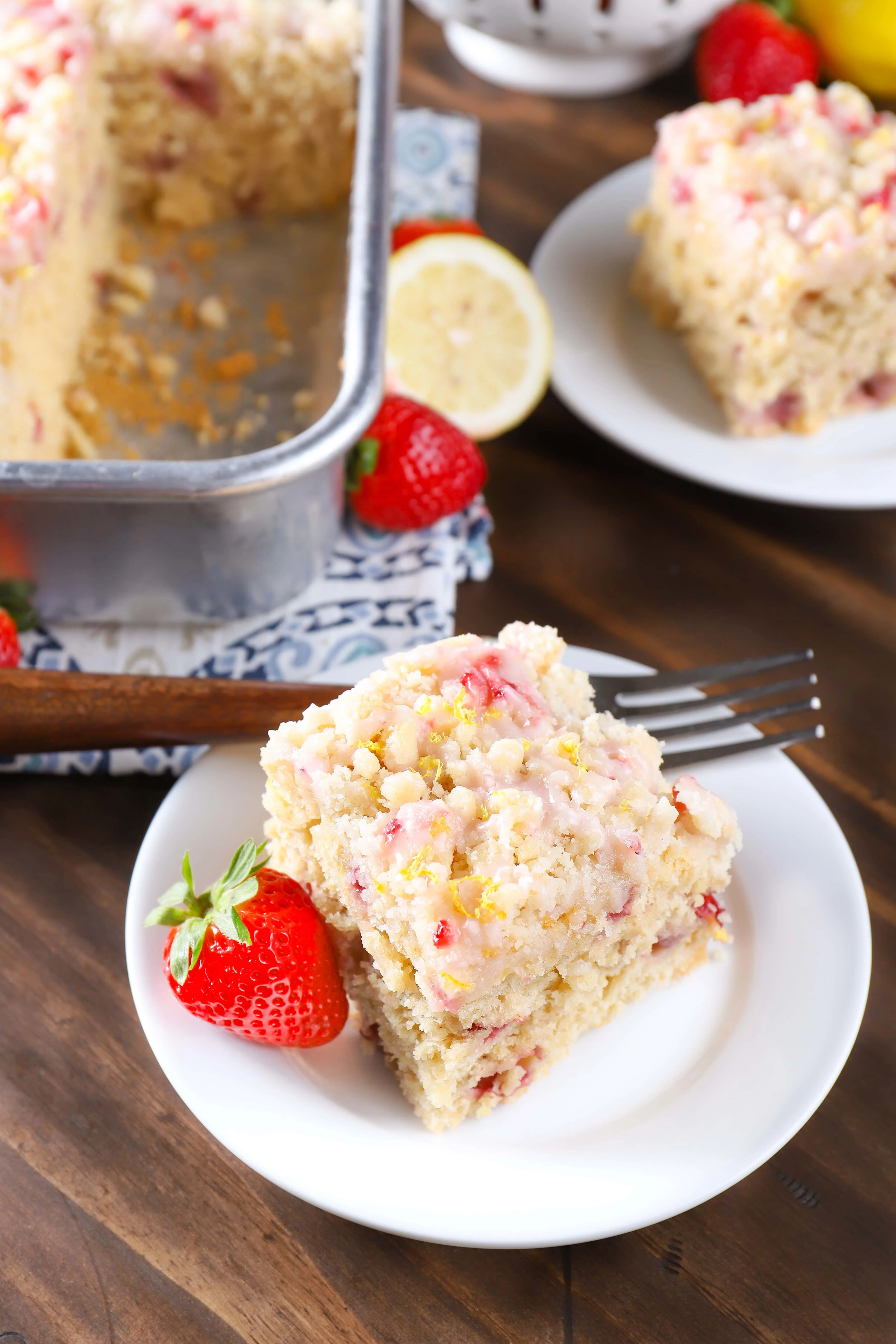 Plates of Strawberry Lemon Yogurt Cake. Recipe from A Kitchen Addiction
