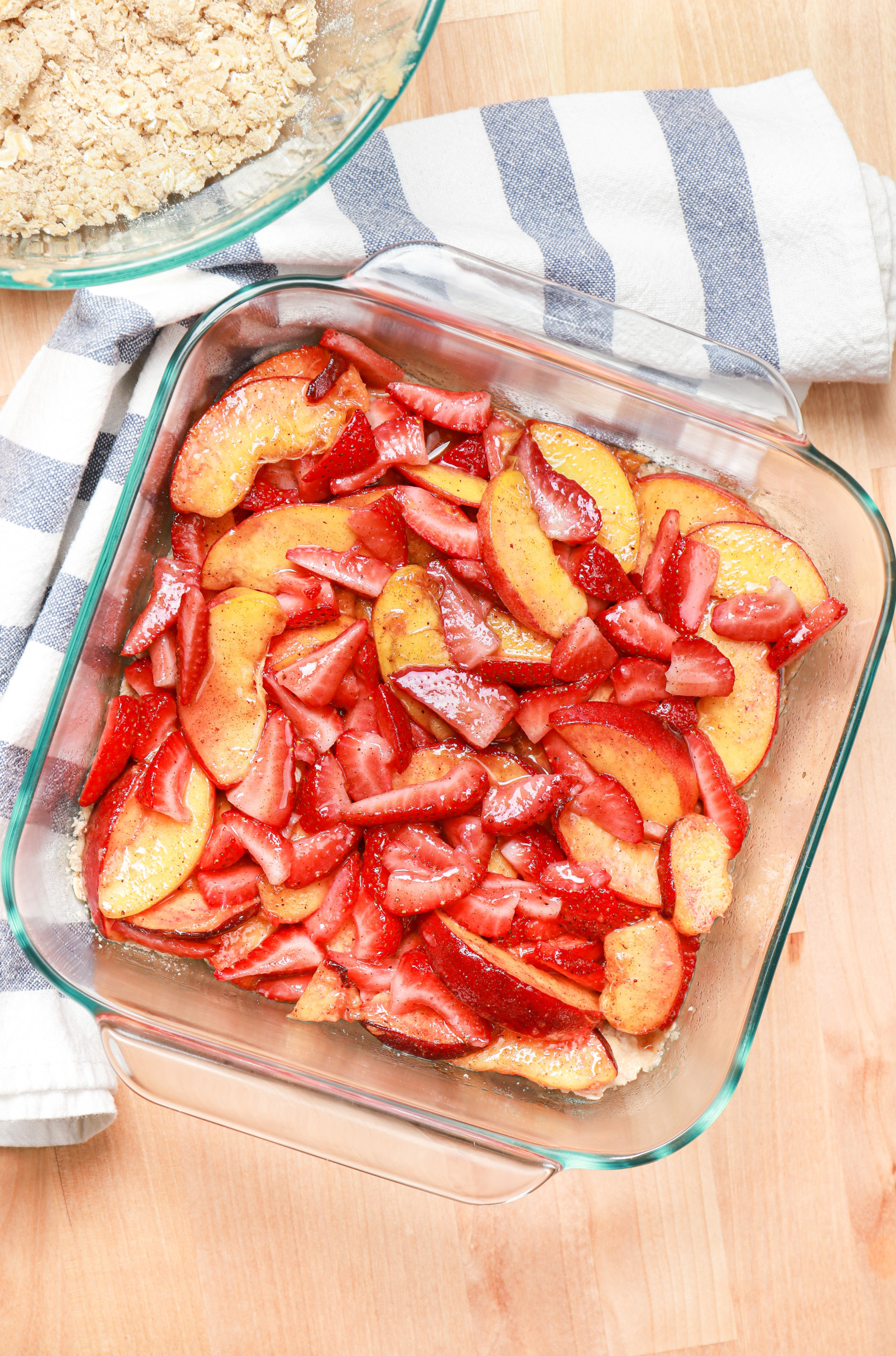 Overhead view of the strawberry peach filling before the crumb topping has been added.