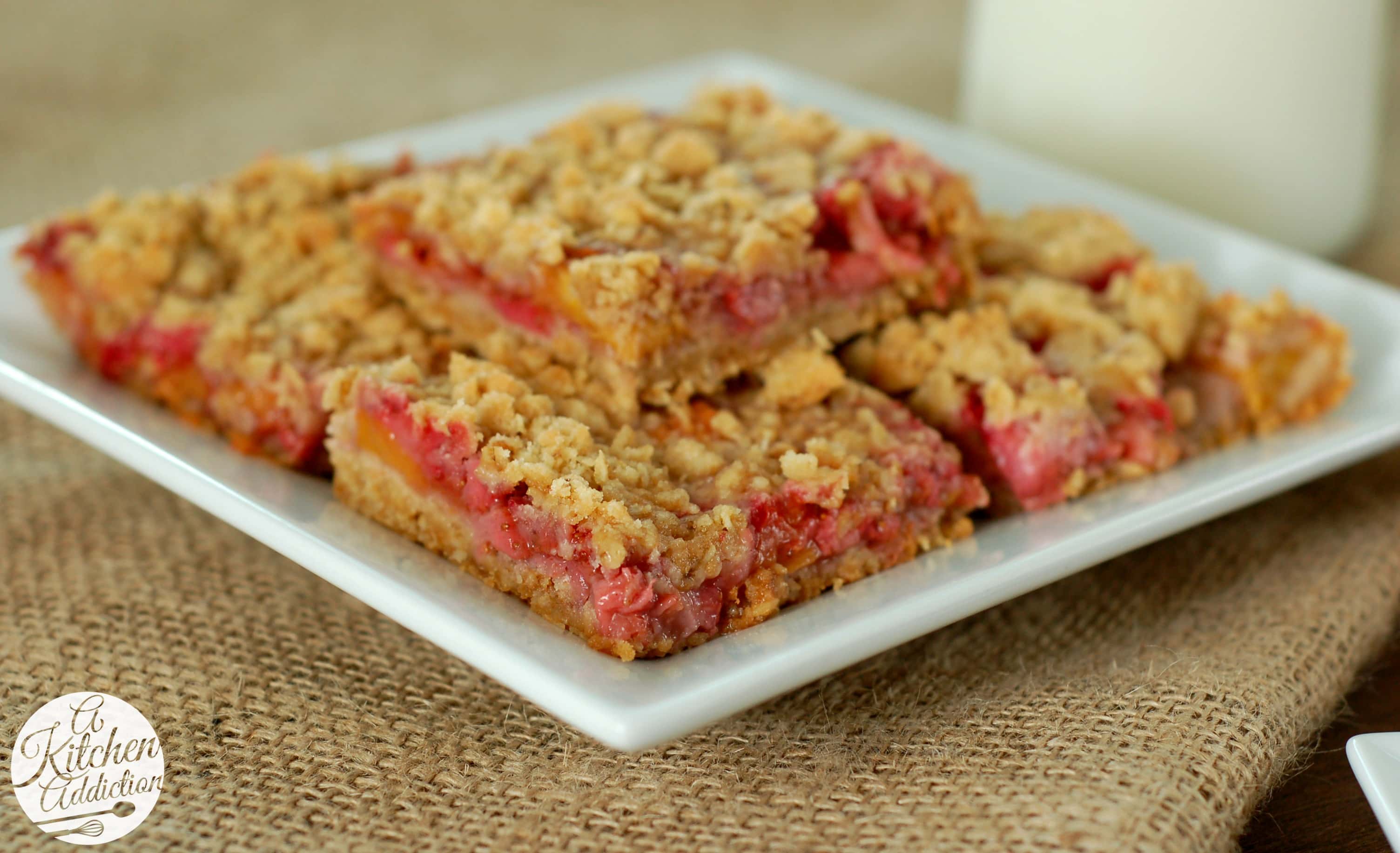 strawberry-peach-streusel-bars-a-kitchen-addiction