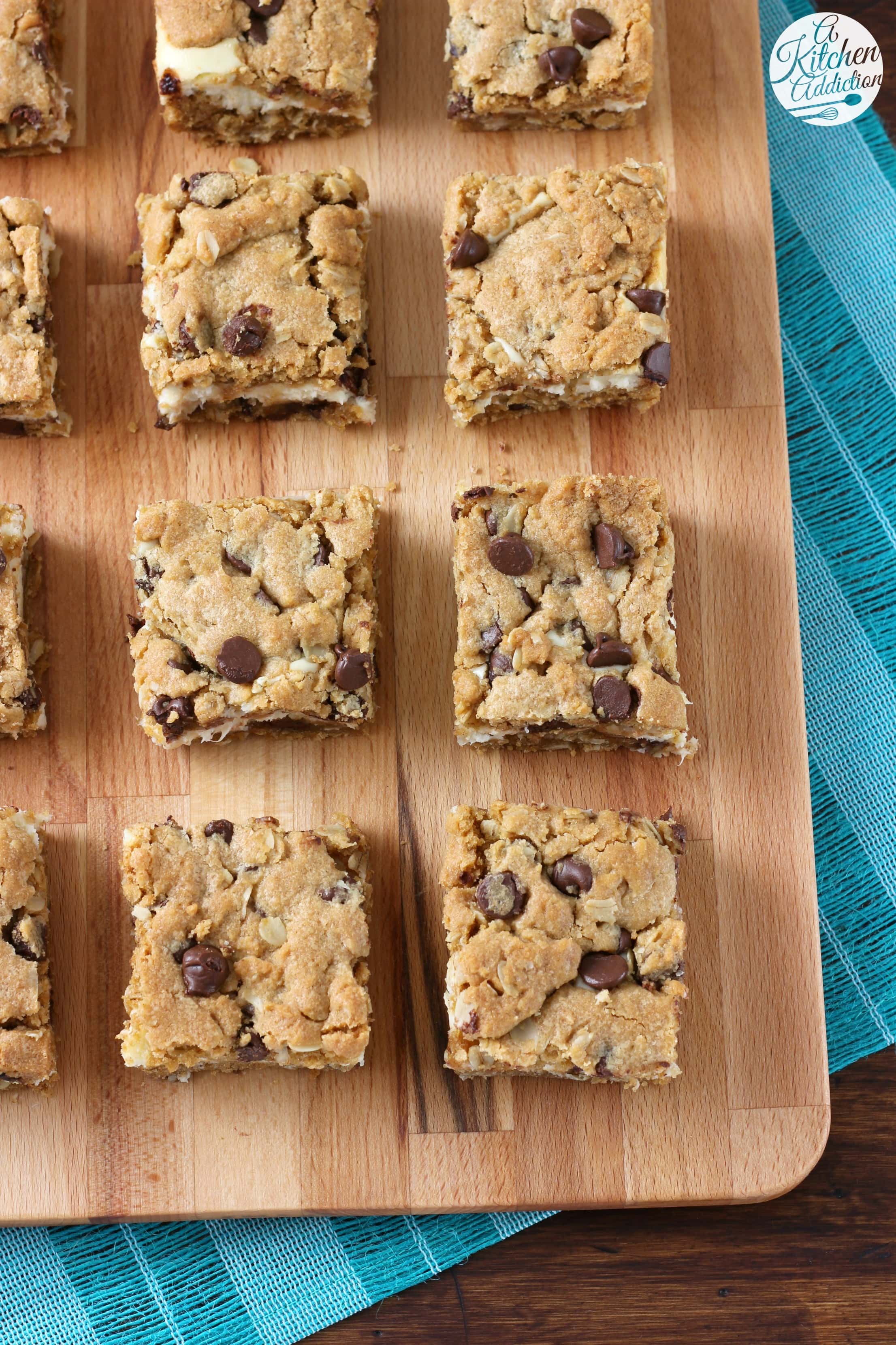 Peanut Butter Chocolate Chip Cheesecake Bars Recipe from A Kitchen Addiction