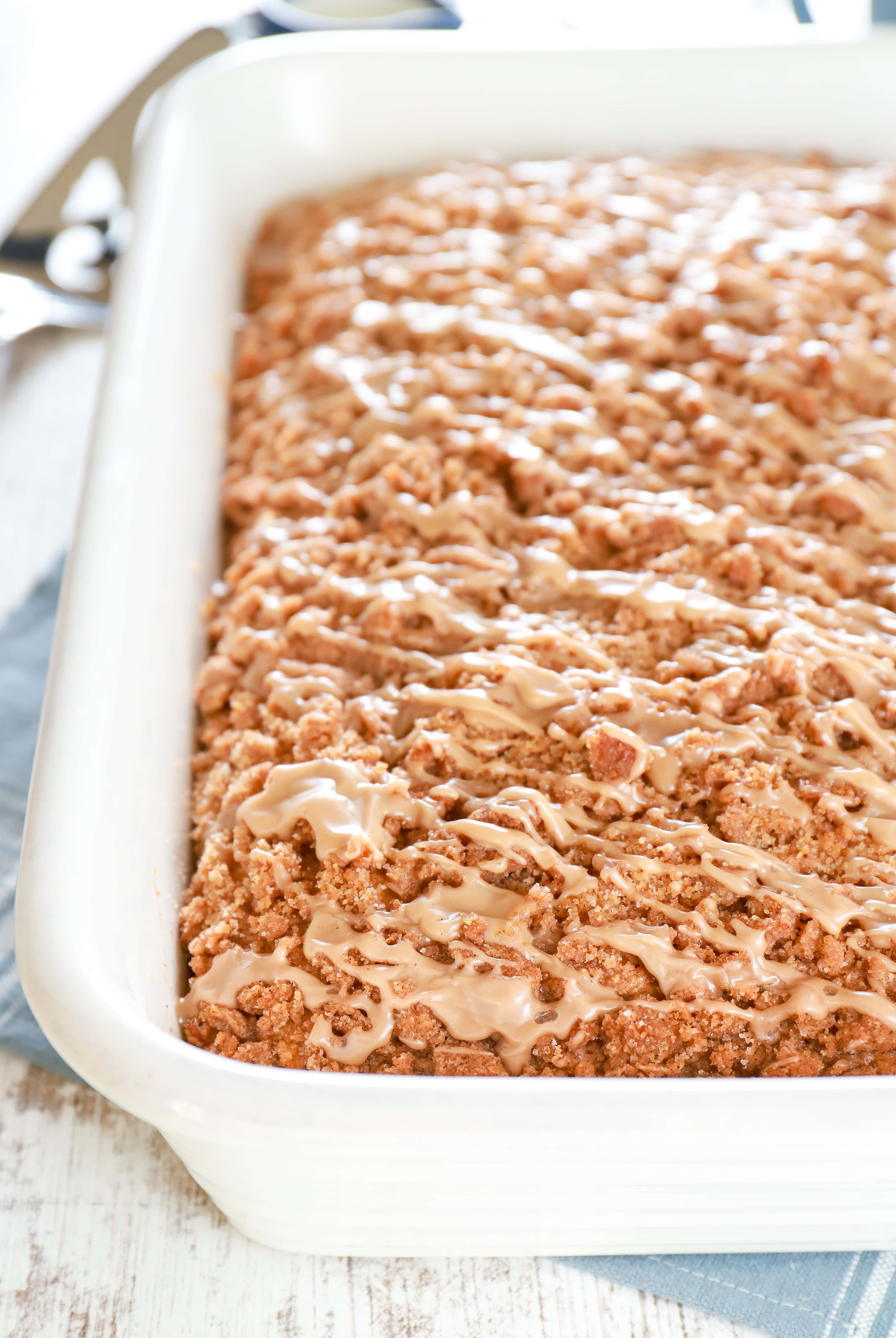 Pan of maple cinnamon pumpkin coffee cake. Recipe from A Kitchen Addiction