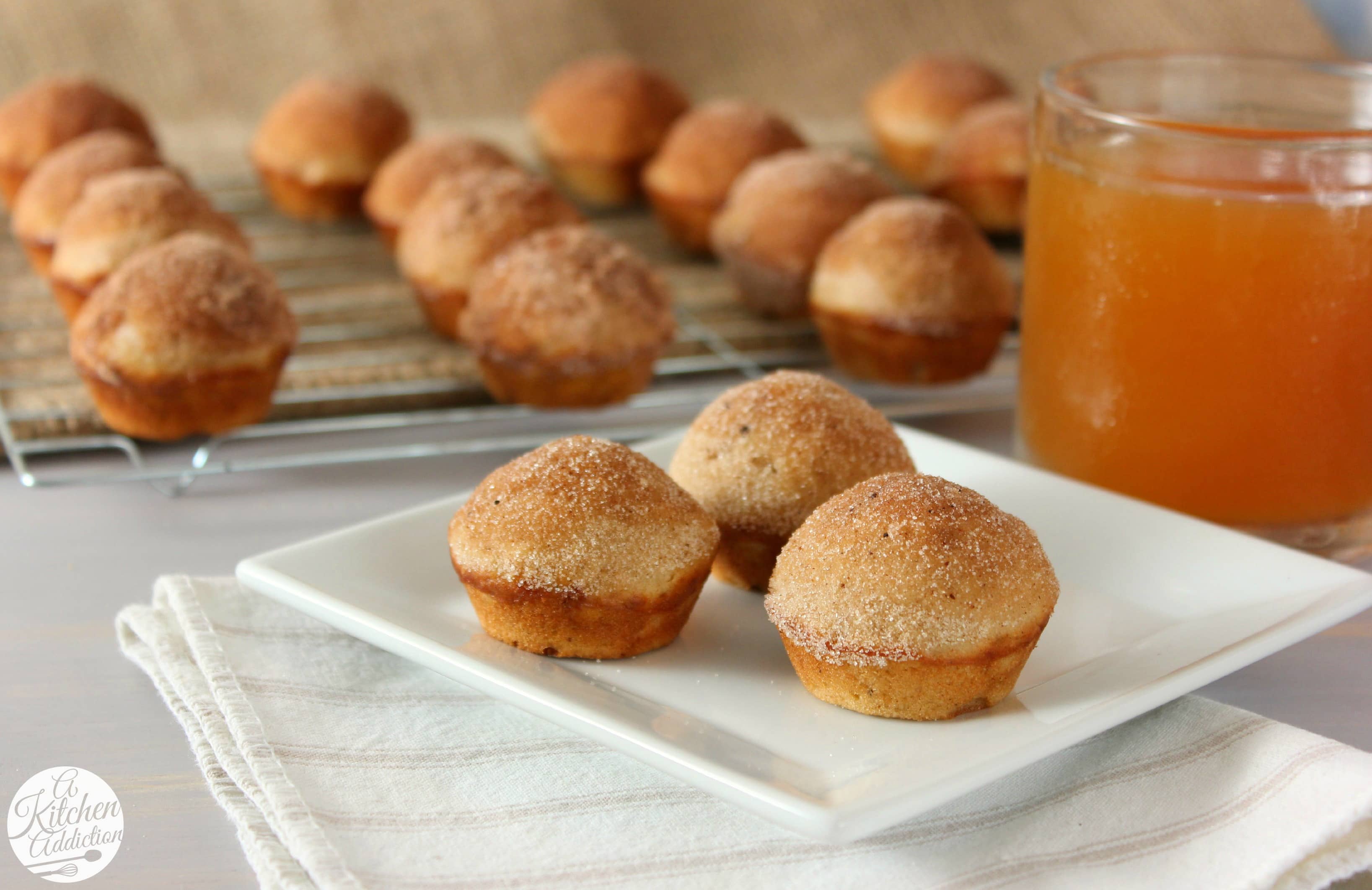 Spiced Apple Cider Donut Muffins - A Kitchen Addiction
