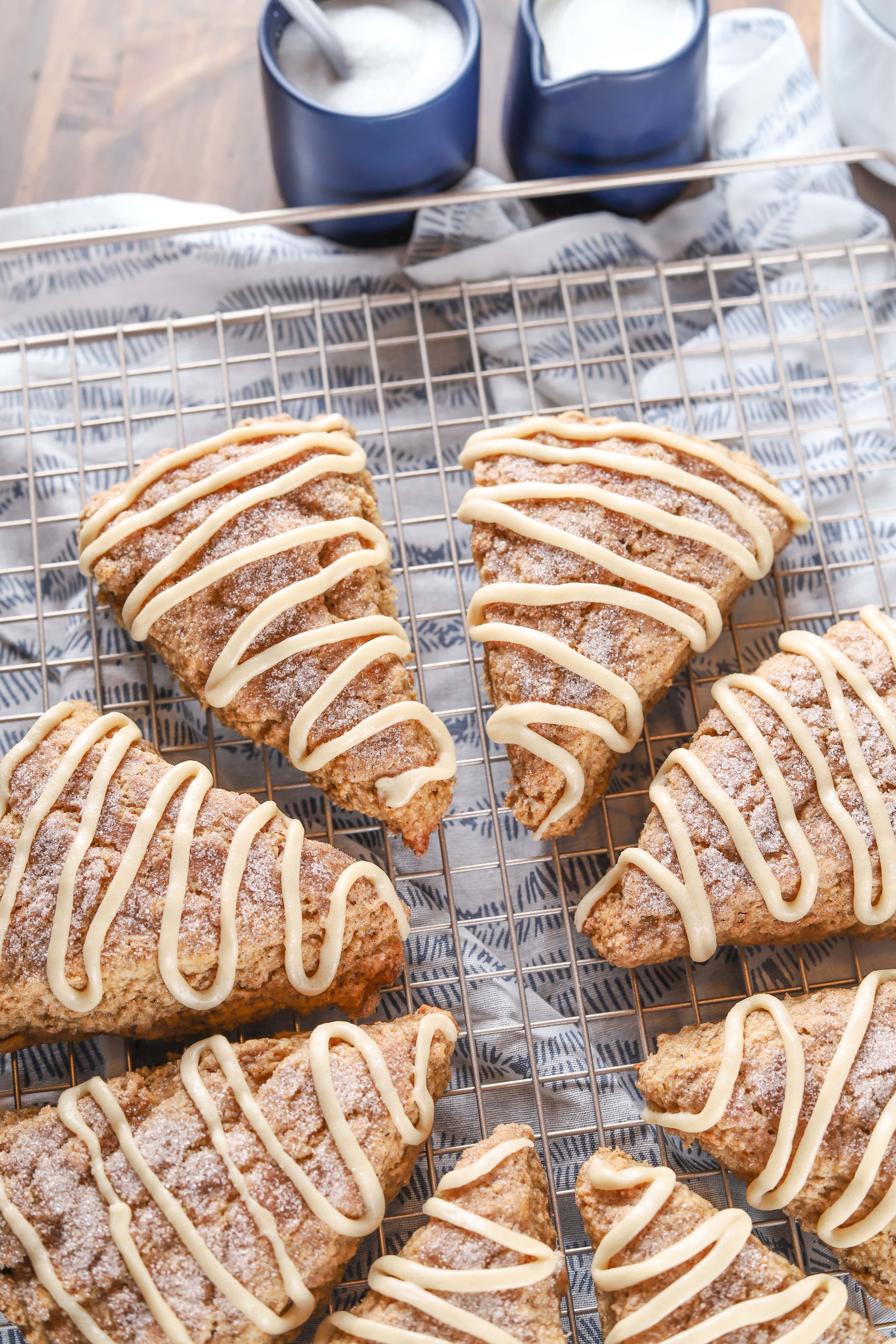 Glazed Banana Bread Scones on cooling rack. Recipe from A Kitchen Addiction