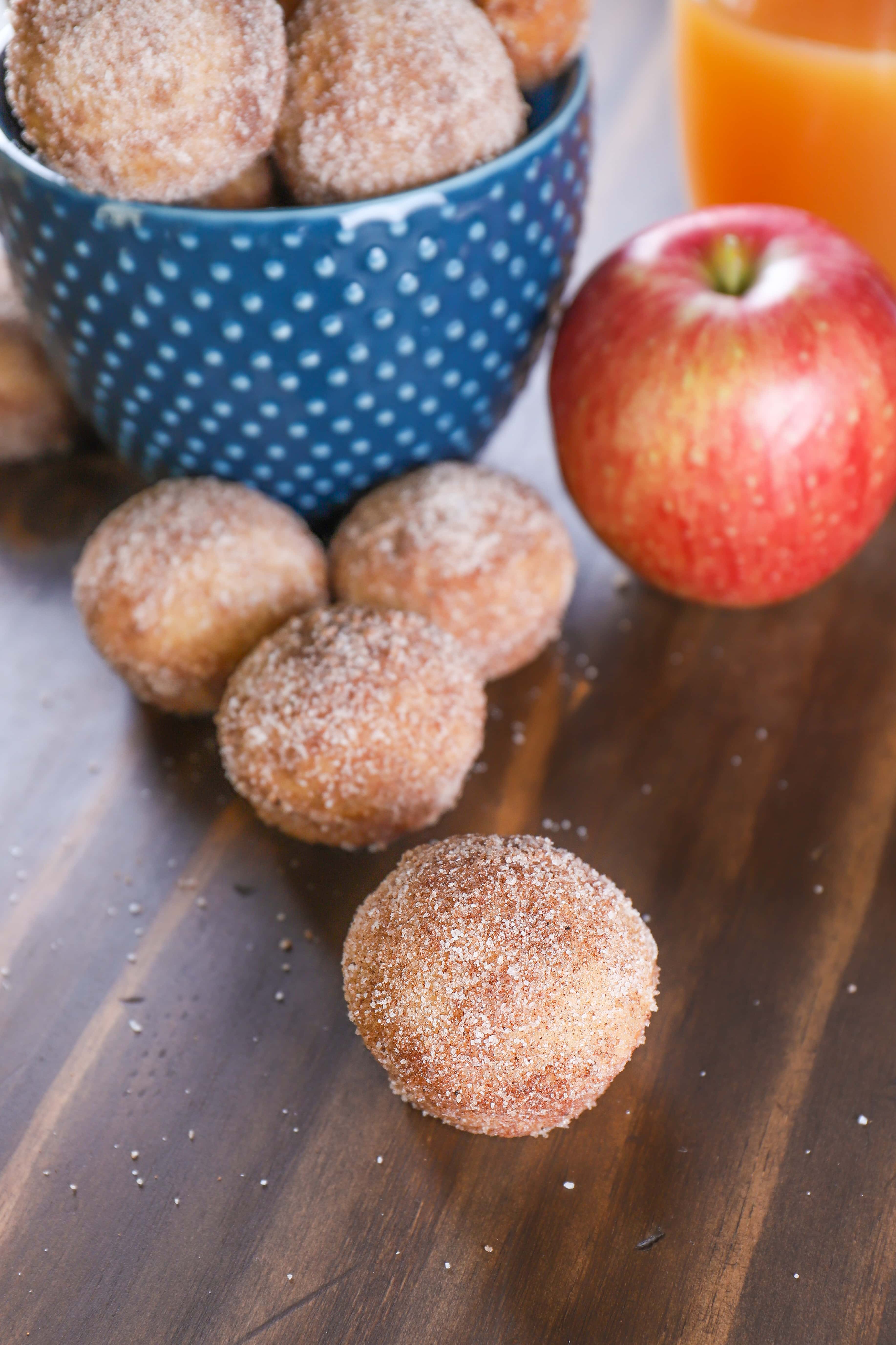 Spiced Apple Cider Mini Donut Muffins in a bowl. Recipe from A Kitchen Addiction