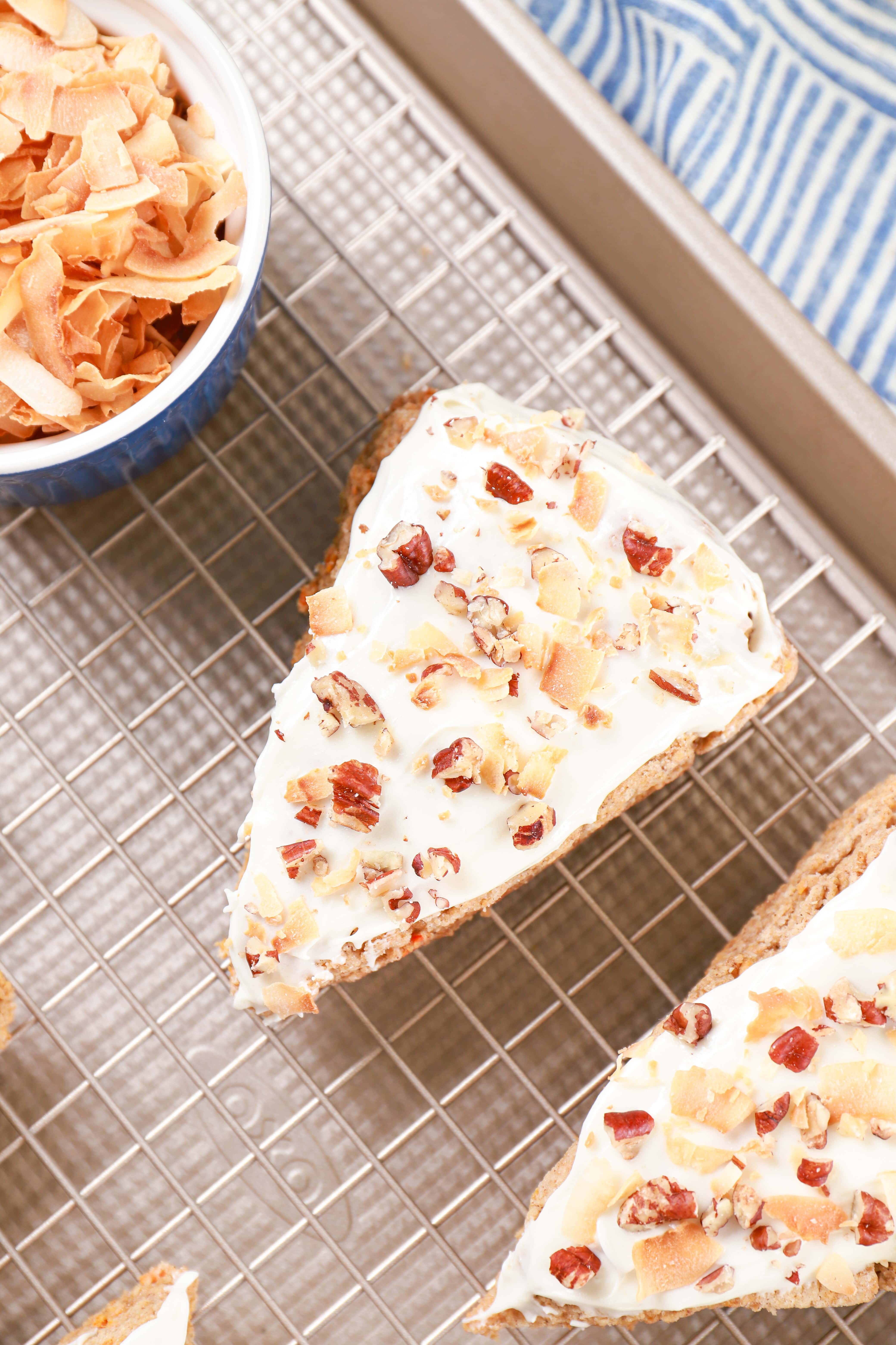 Overhead view of one Carrot Cake Scone on a cooling rack. Recipe from A Kitchen Addiction