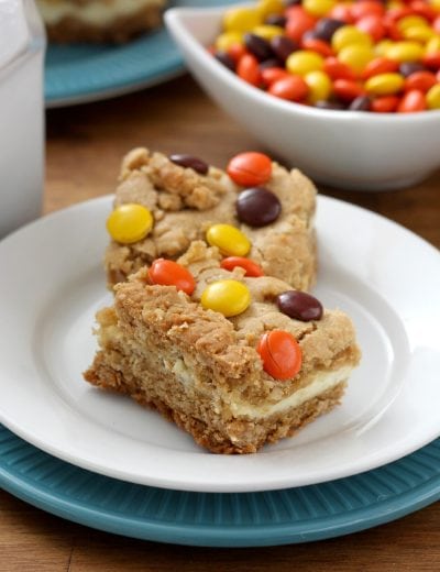 Reese's Pieces Peanut Butter Cookie Cheesecake Bars Recipe l www.a-kitchen-addiction.com