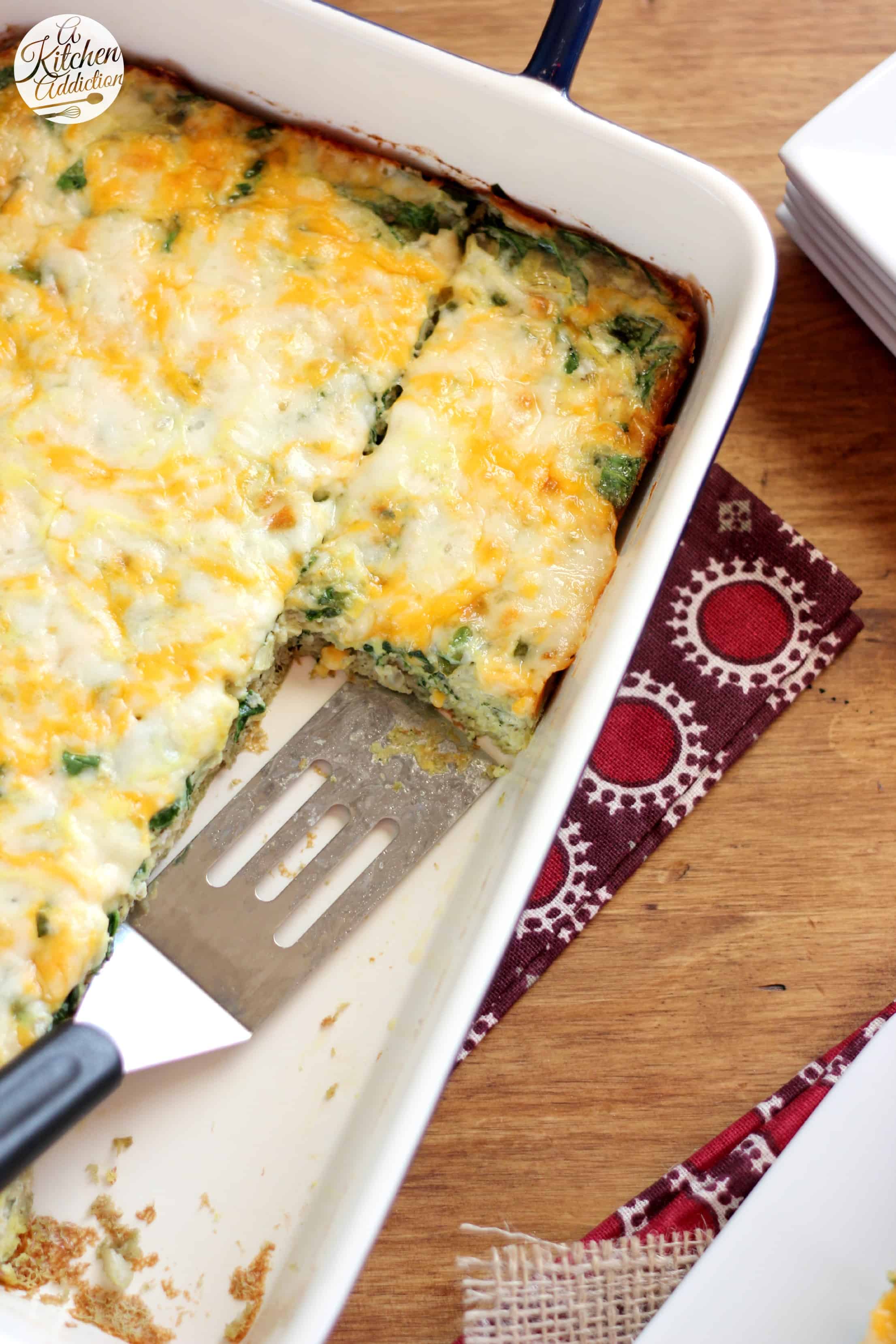 Cheesy Spinach and Artichoke Egg Bake - A Kitchen Addiction
