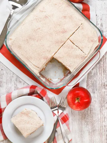 Overhead view of a apple cake with maple frosting. Recipe for cake from A Kitchen Addiction