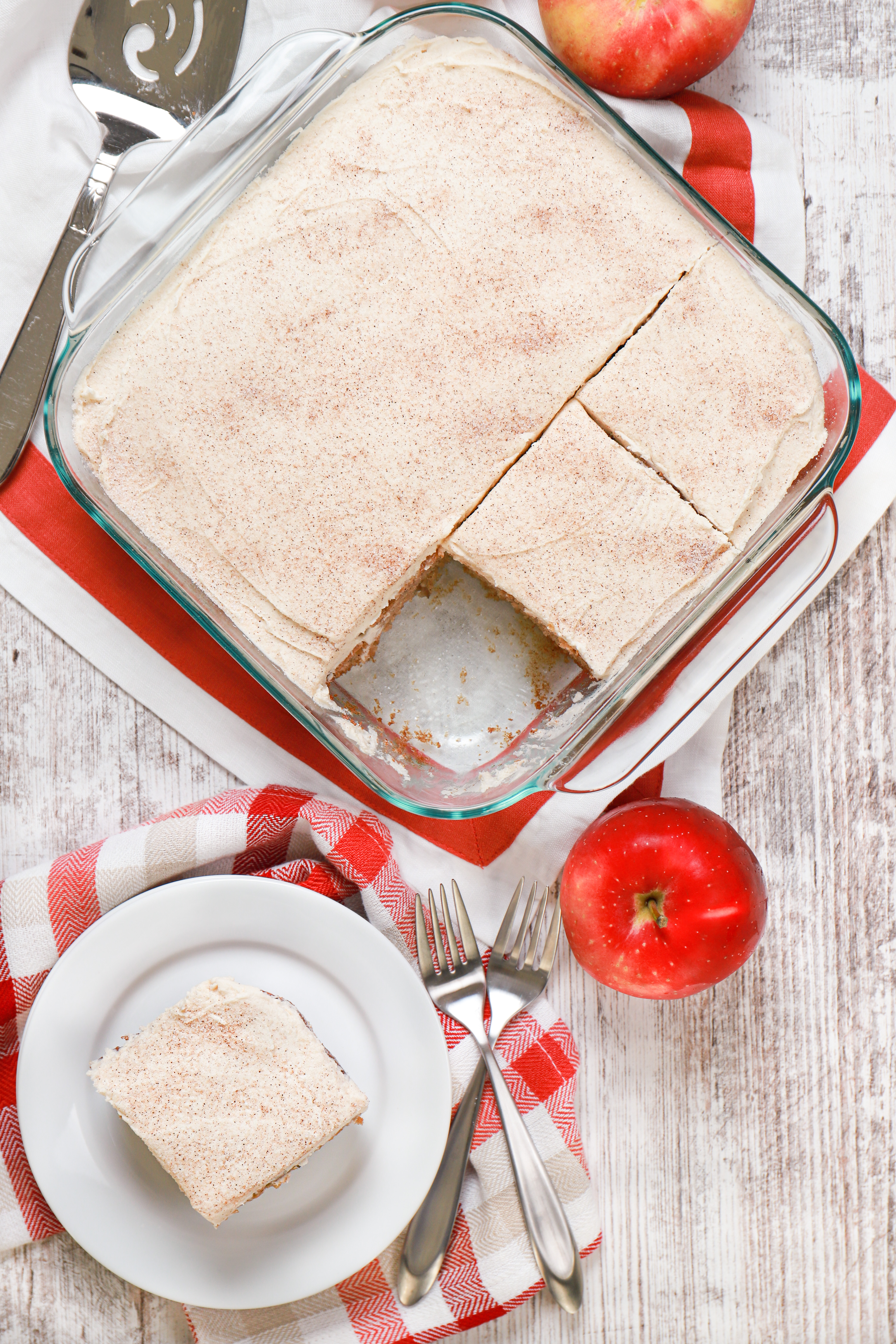 Overhead view of a apple cake with maple frosting. Recipe for cake from A Kitchen Addiction