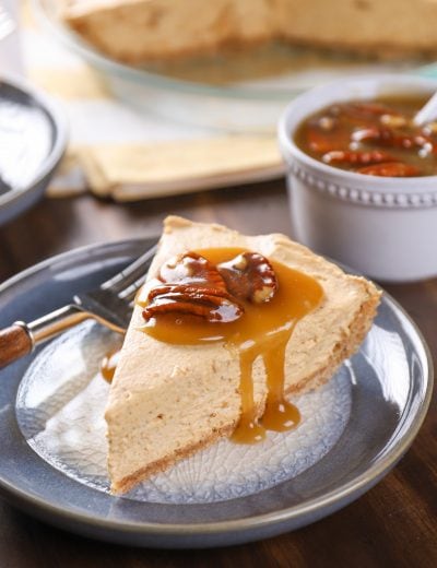 Maple Pumpkin Cheesecake with Pecan Praline Topping