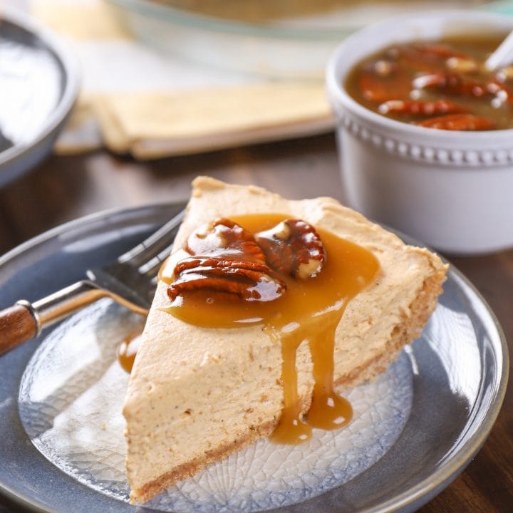 Maple Pumpkin Cheesecake with Pecan Praline Topping
