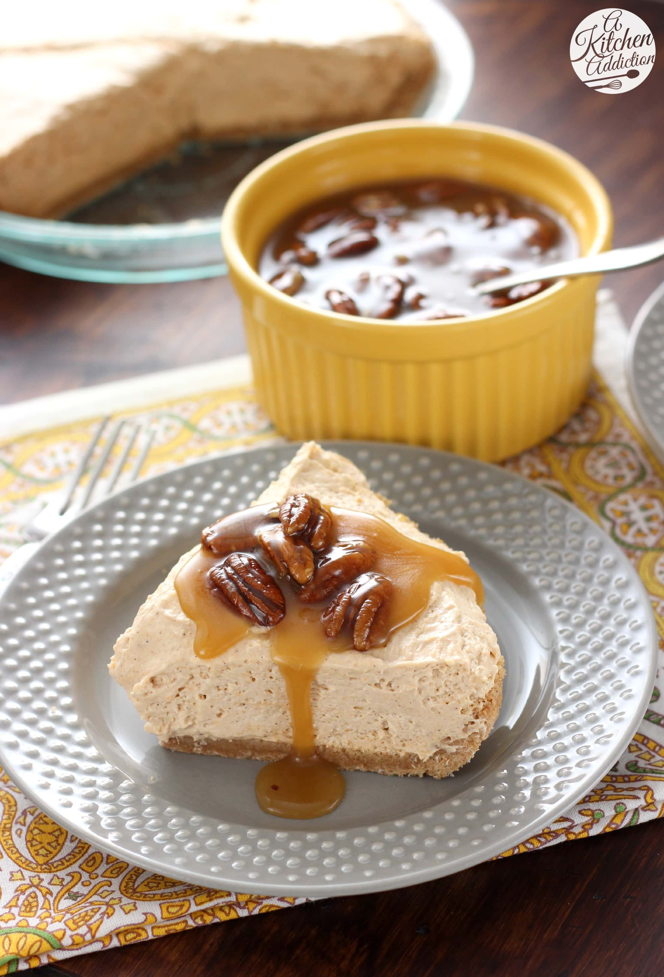 Maple Pumpkin Cheesecake with Pecan Praline Topping A Kitchen Addiction