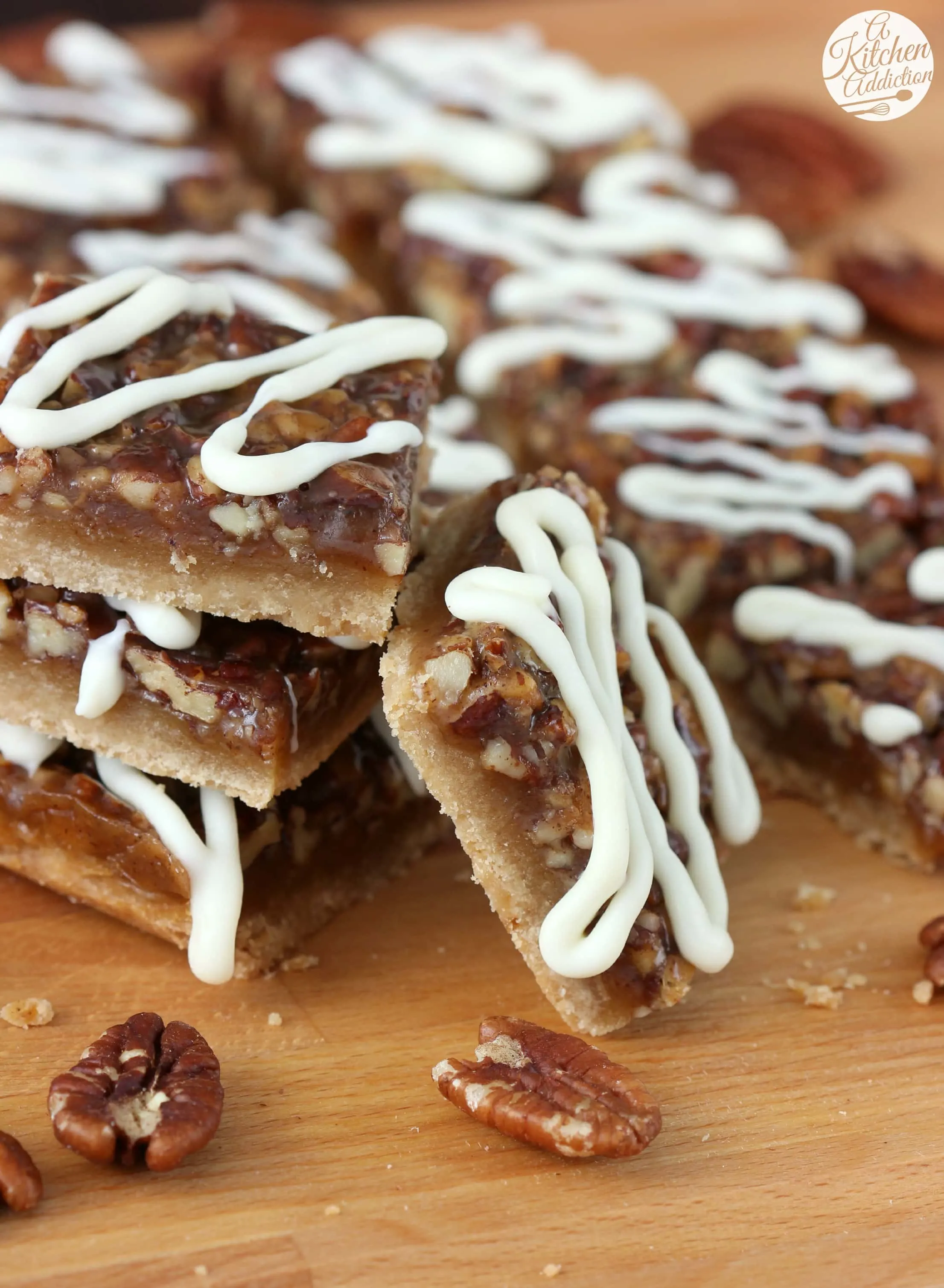 Cinnamon Honey Pecan Pie Bars with White Chocolate Drizzle