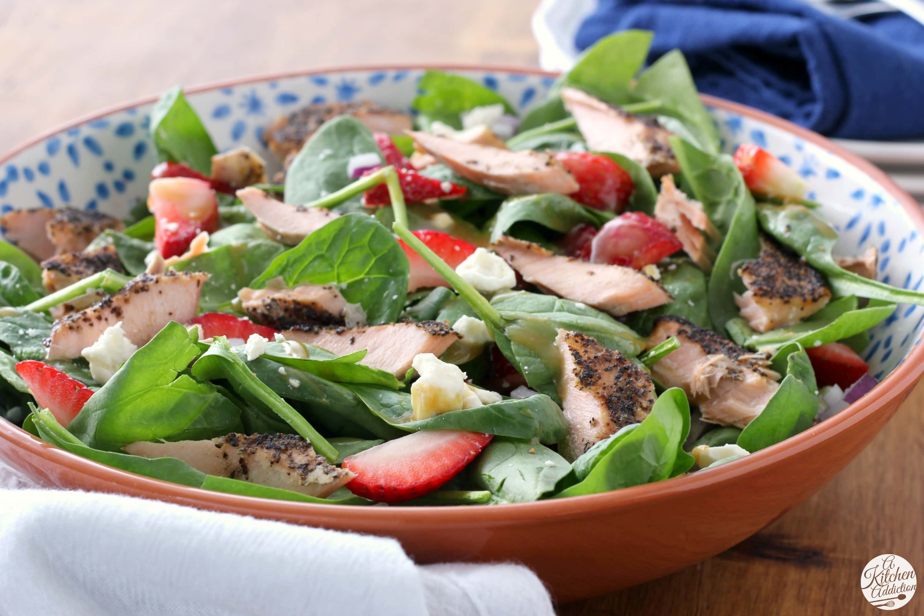 Baked Salmon Strawberry Spinach Salad with Honey Dijon Vinaigrette Recipe from A Kitchen Addiction