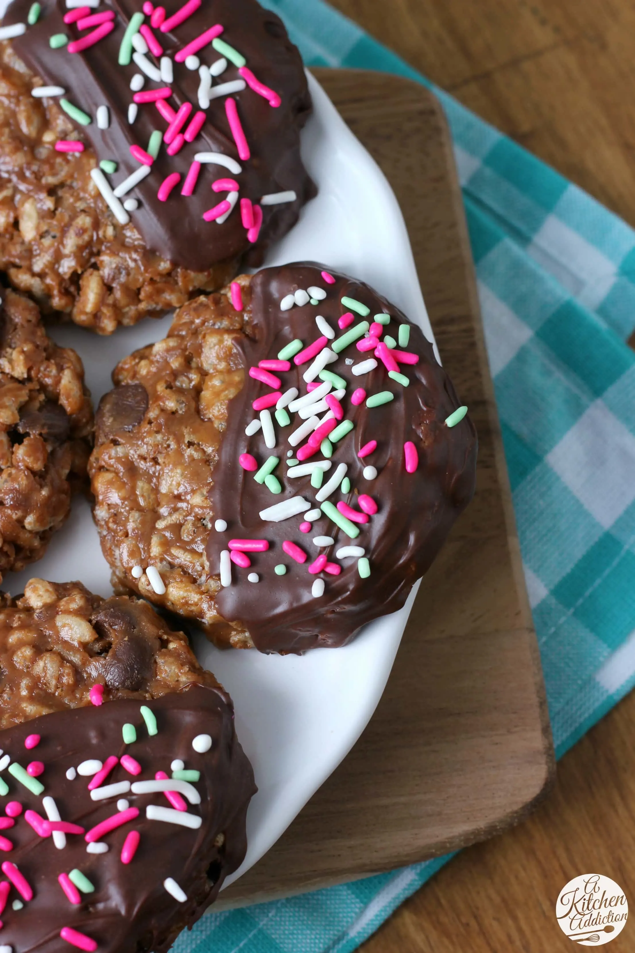 Overhead view of a no bake chocolate peanut butter crunch cookie on a white plate.