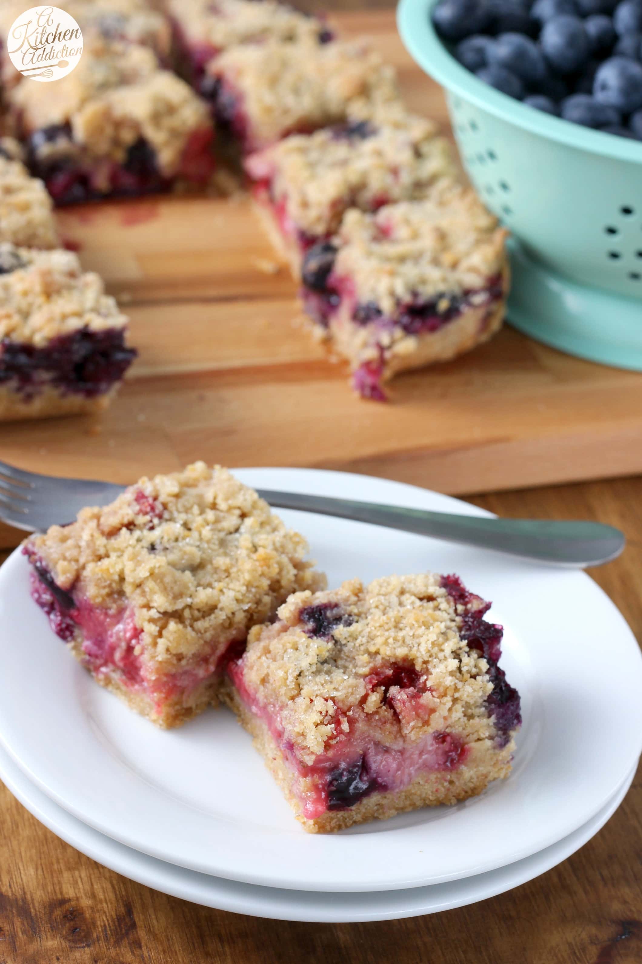 Easy Strawberry Blueberry Crumb Bars Recipe from A Kitchen Addiction