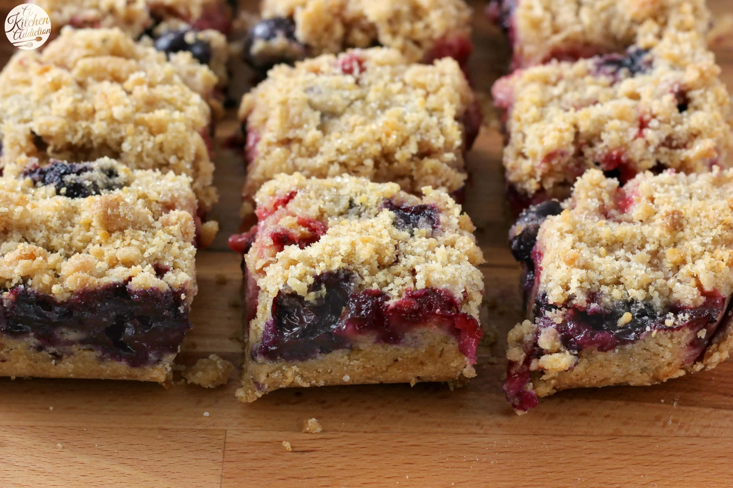 Strawberry Blueberry Crumb Bars Recipe from A Kitchen Addiction