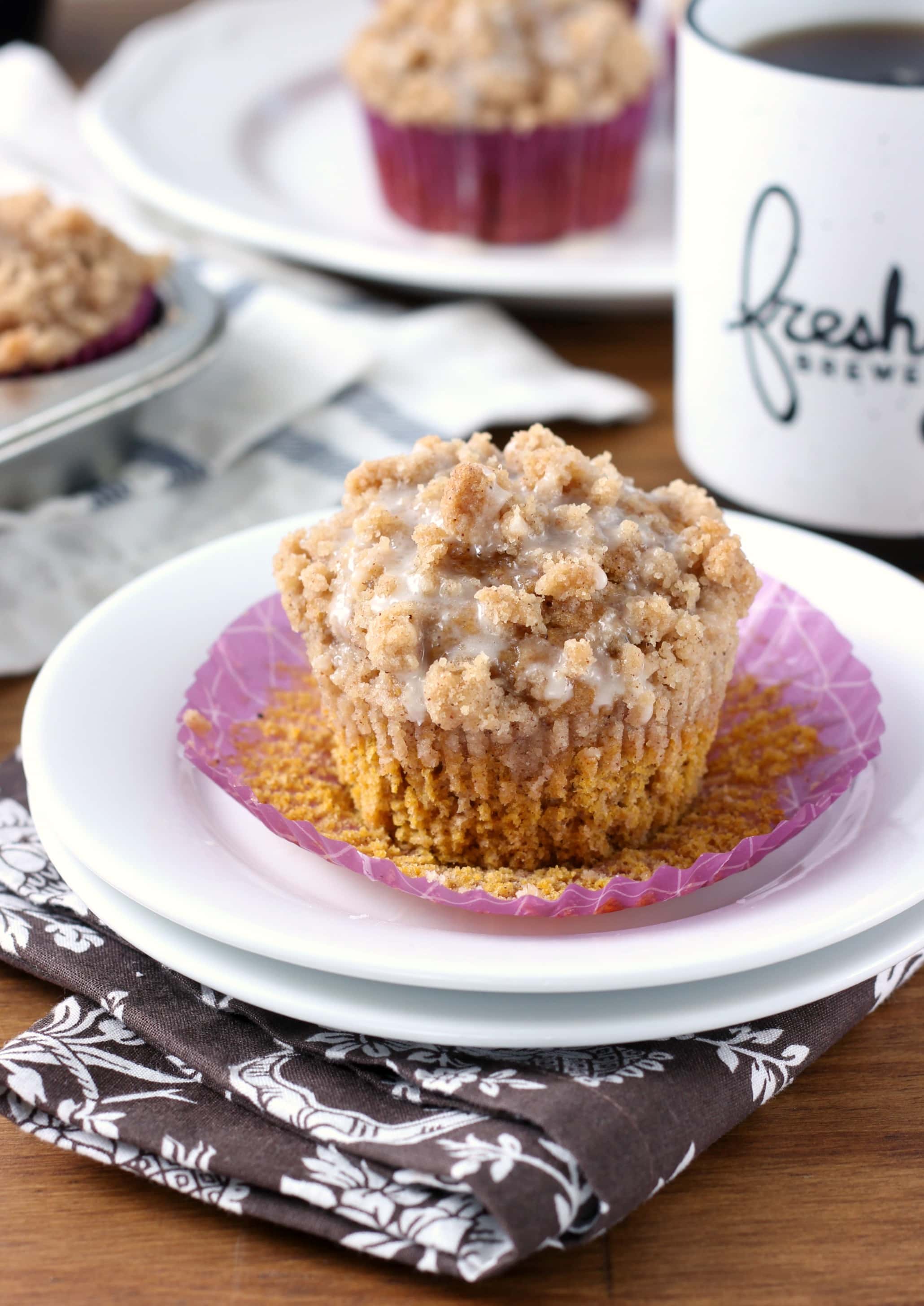 Pumpkin Coffee Cake Muffins with Maple Glaze Recipe from A Kitchen Addiction