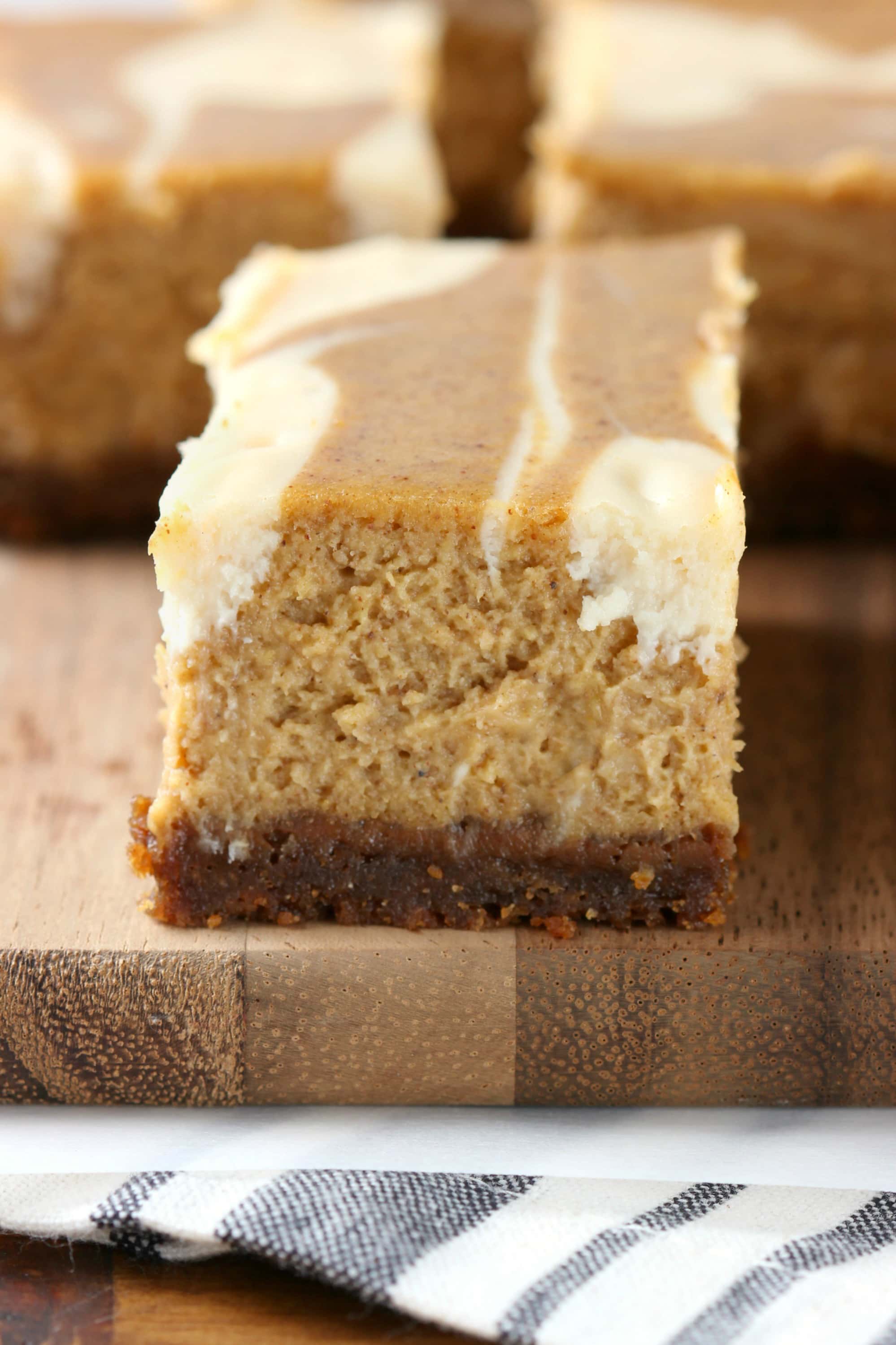 Swirled Pumpkin Pie Cheesecake Bars with Gingersnap Crust - A Kitchen ...