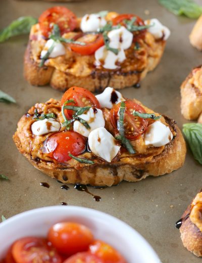 Caprese Roasted Red Pepper Hummus Crostini Recipe from A Kitchen Addiction