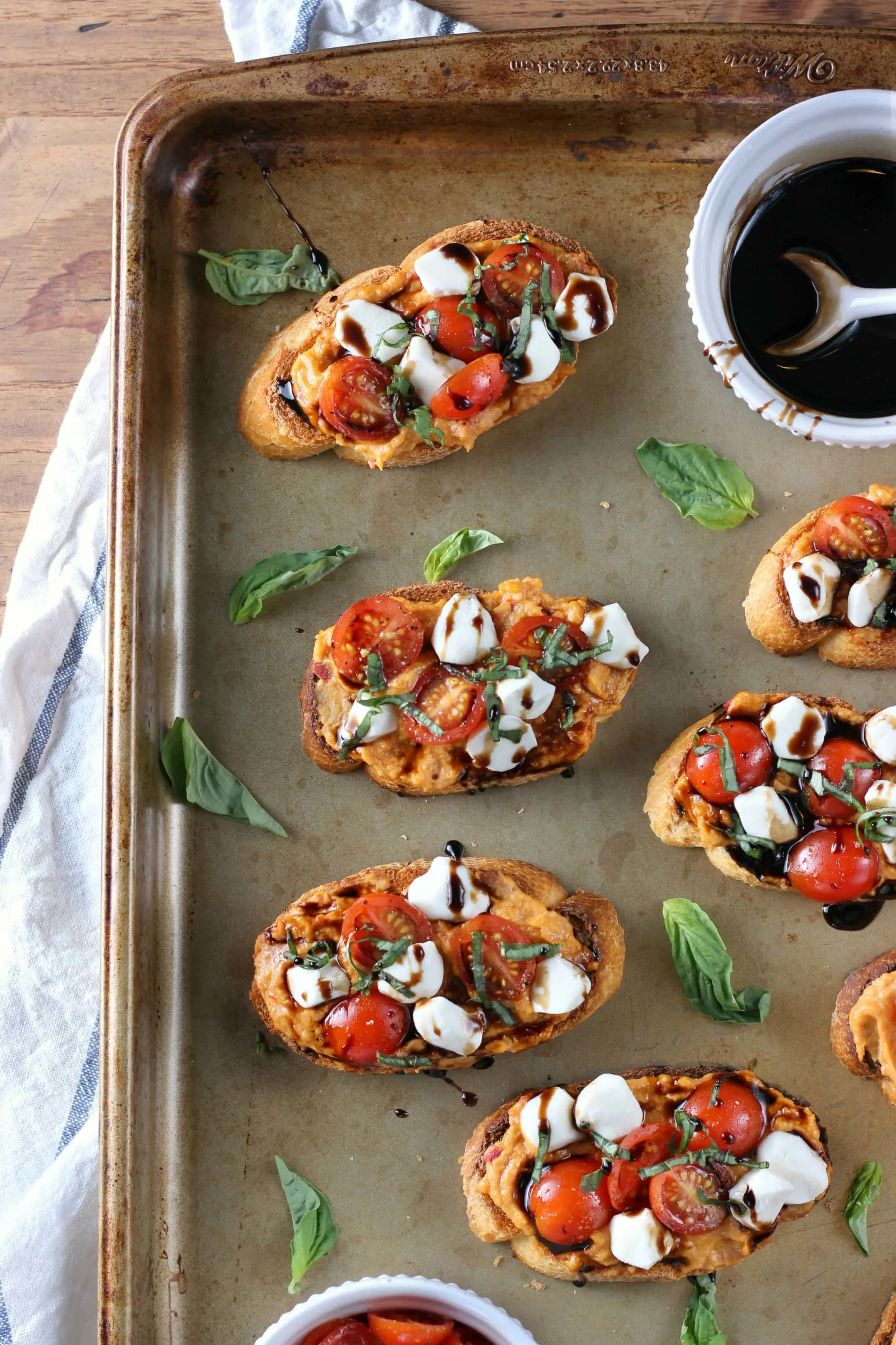 Caprese Roasted Red Pepper Hummus Crostini Recipe from A Kitchen Addiction