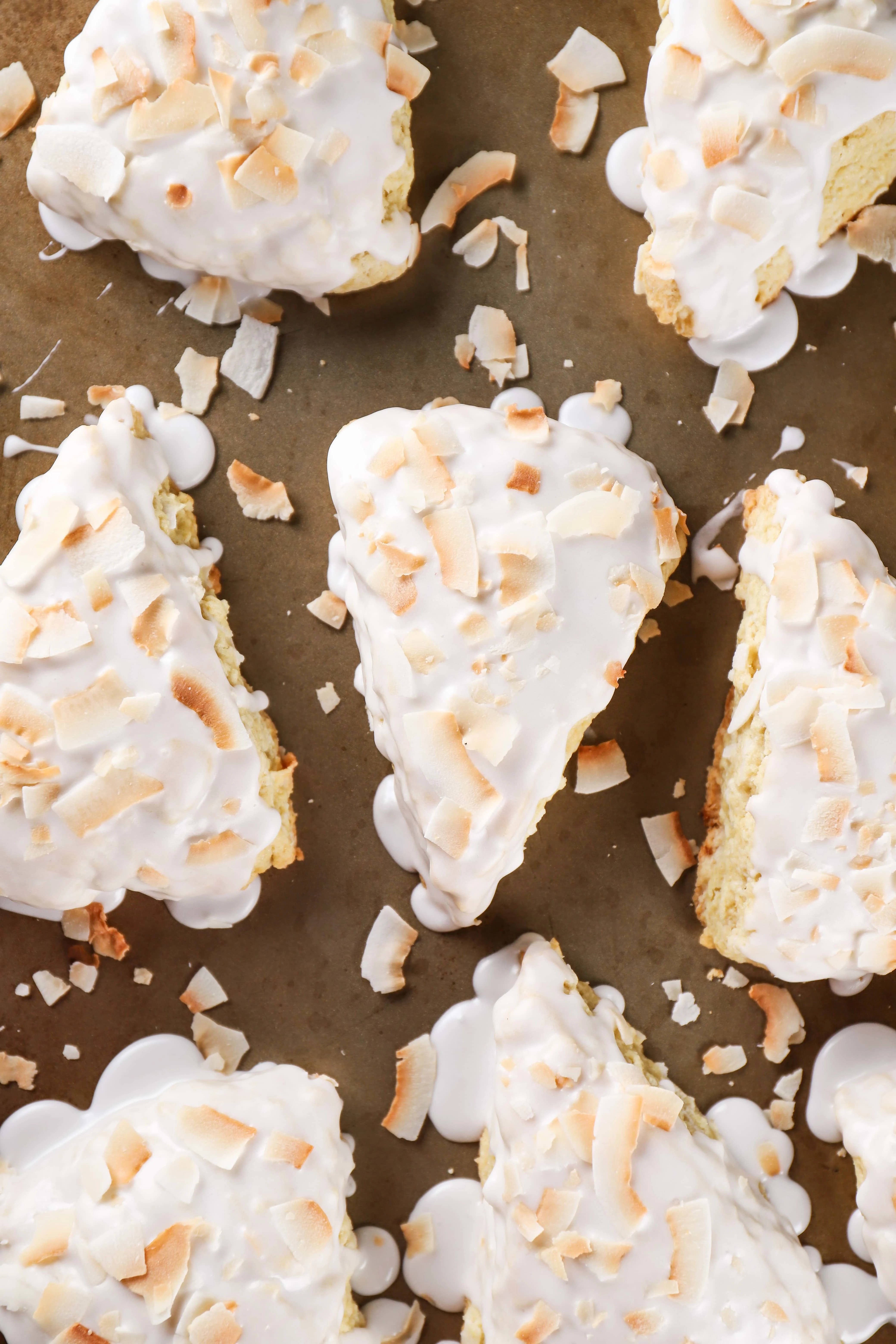 Image of Coconut Cream Scones on baking sheet. Recipe from A Kitchen Addiction