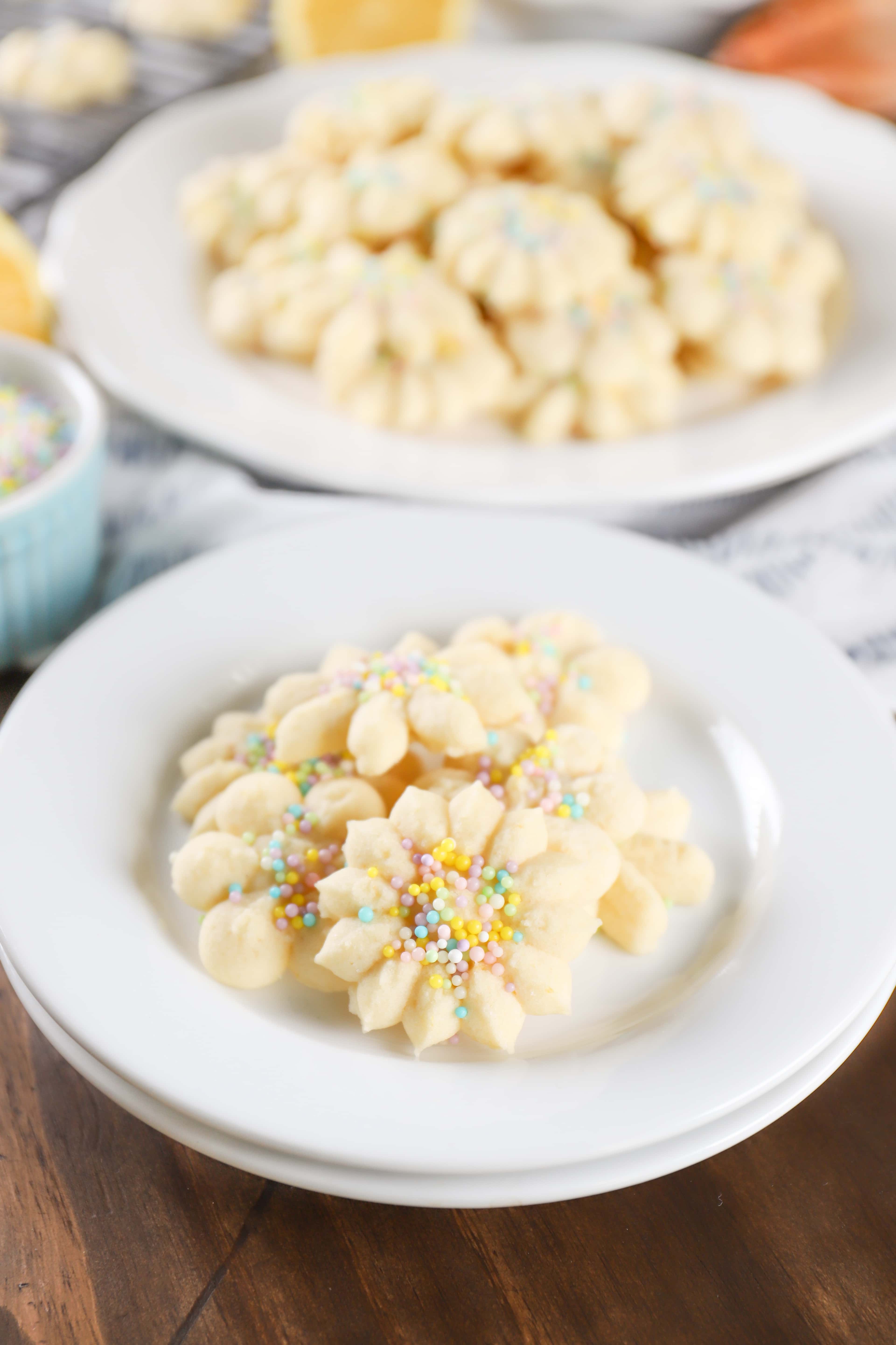 Plated Lemon Spritz Cookies. Recipe from A Kitchen Addiction