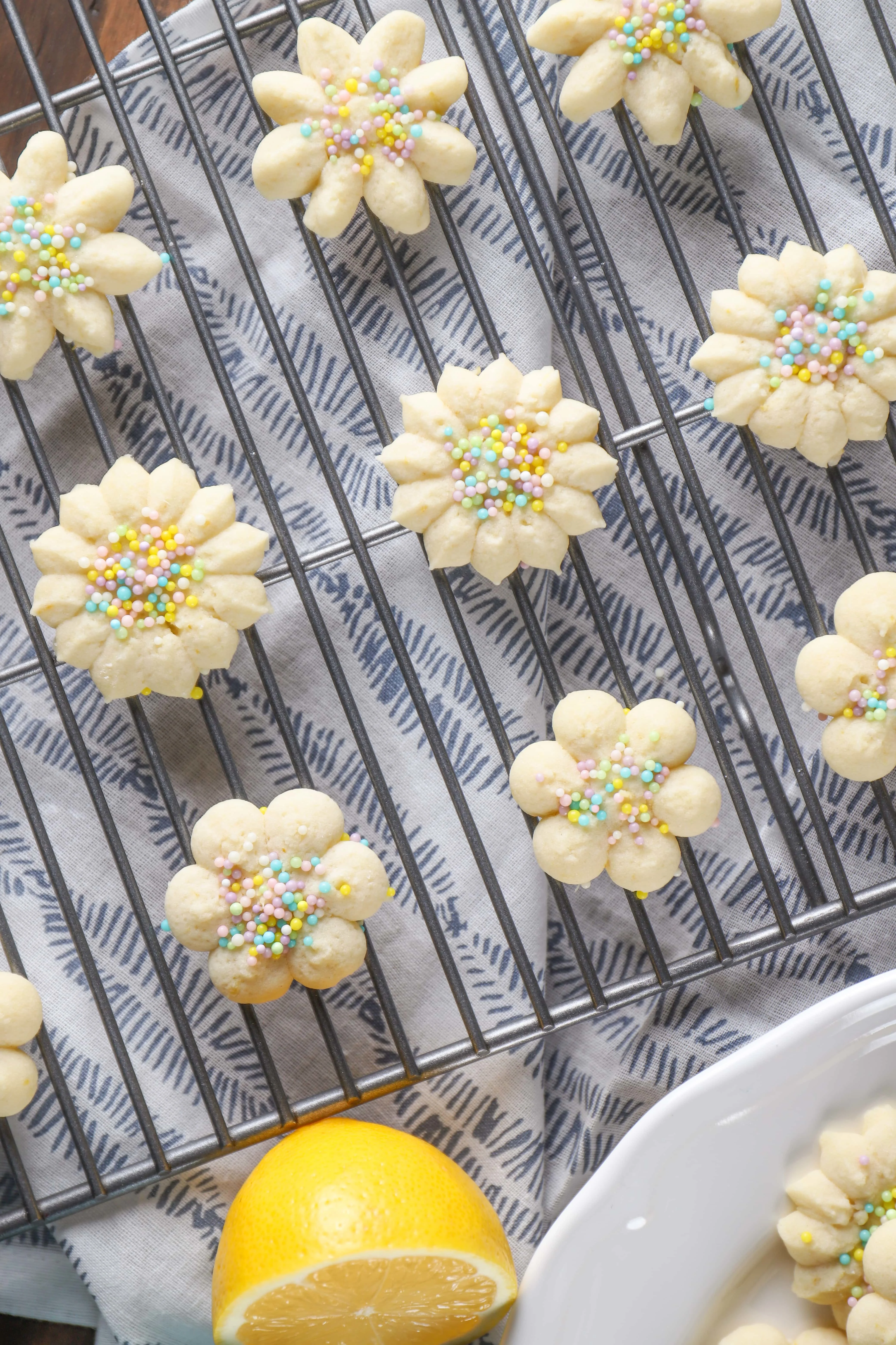 Lemon Spritz Cookies on cooling rack. Recipe from A Kitchen Addiction