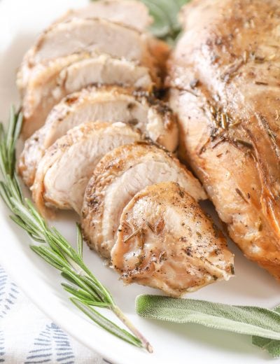 Plated and Sliced Slow Cooker Spiced Apple Cider Turkey Breast. Recipe from A Kitchen Addiction