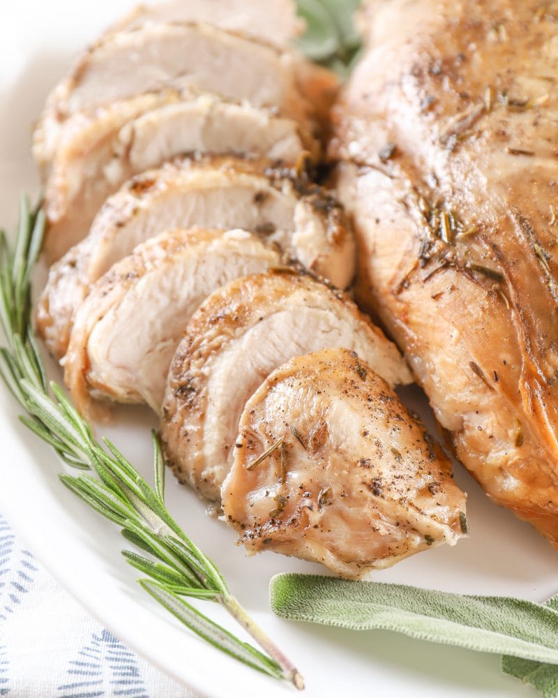Plated and Sliced Slow Cooker Spiced Apple Cider Turkey Breast. Recipe from A Kitchen Addiction