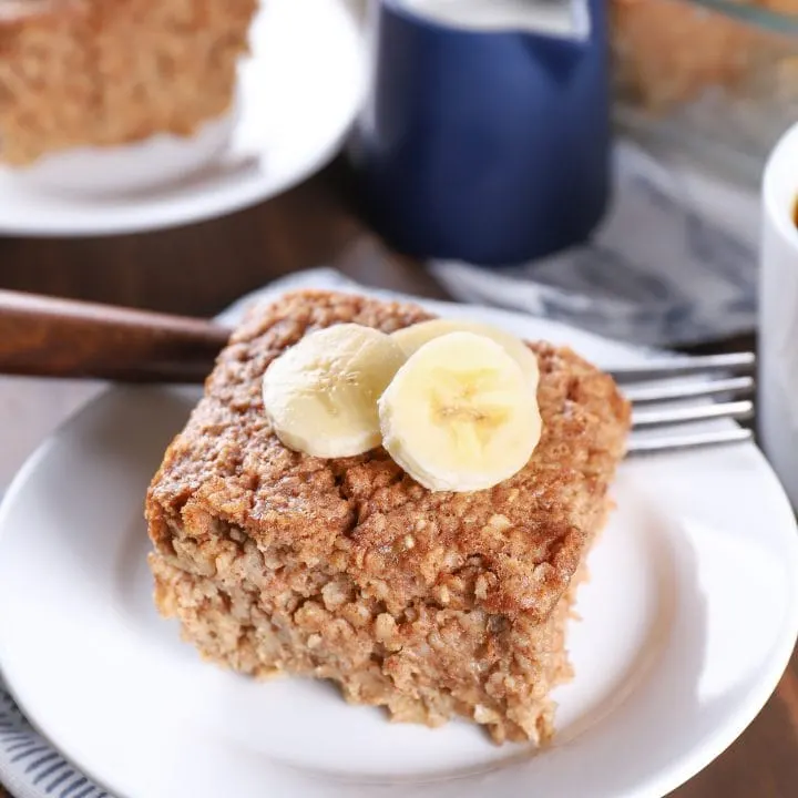 piece of almond butter banana bread baked oatmeal topped with banana slices