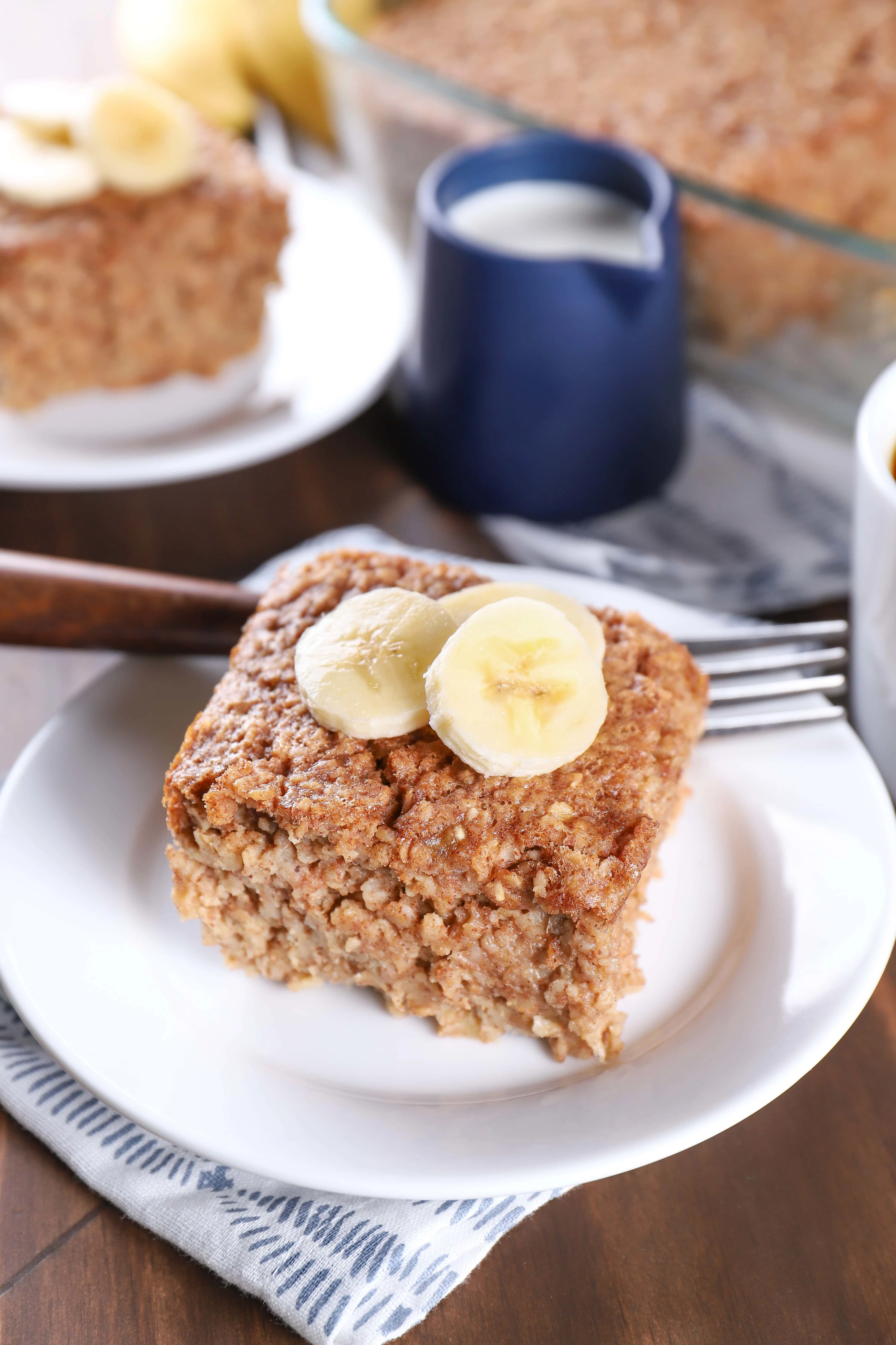 piece of almond butter banana bread baked oatmeal topped with banana slices