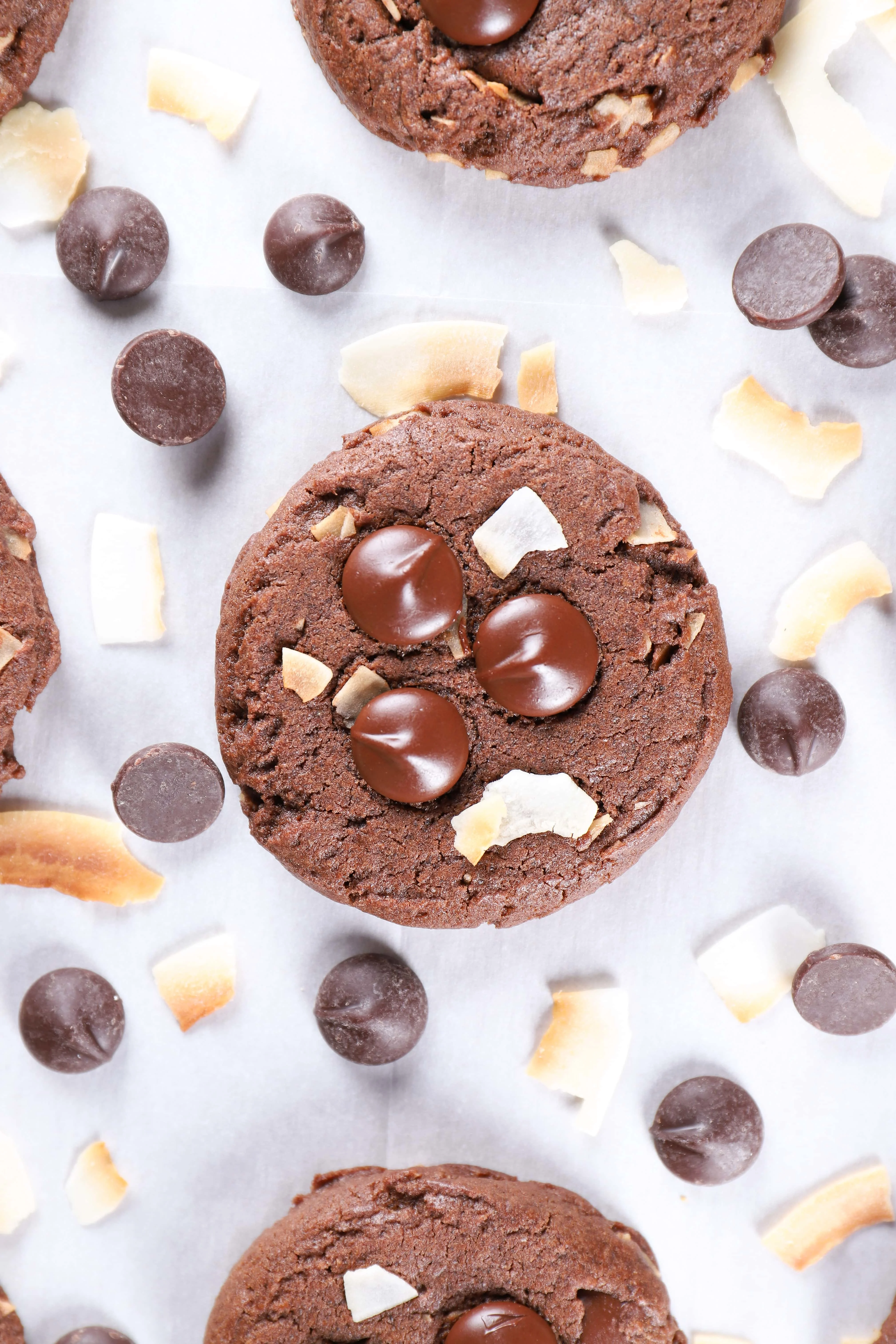 chewy dark chocolate coconut cookies on a cookie sheet