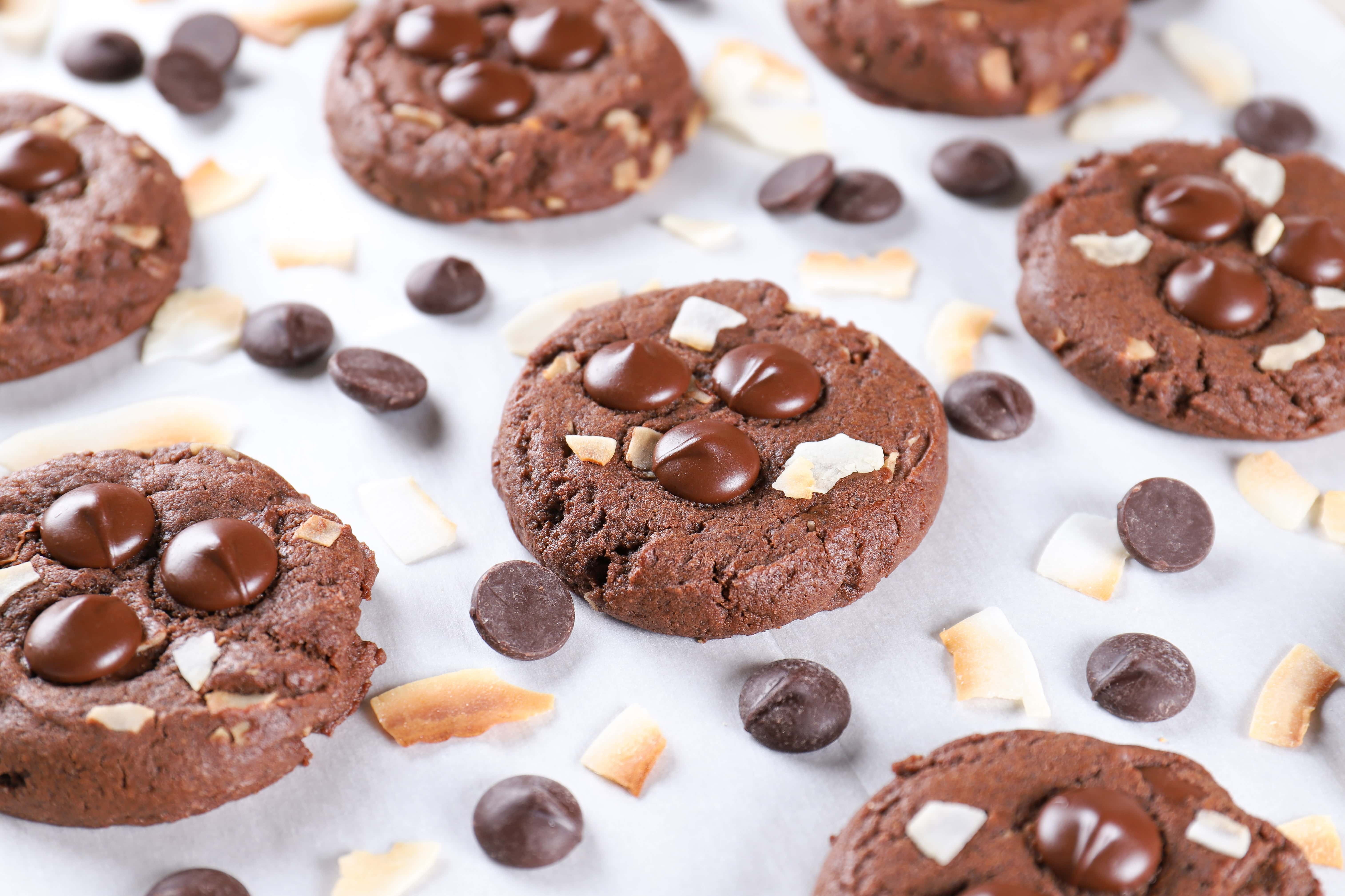 up close image of chewy dark chocolate coconut cookies in a baking sheet