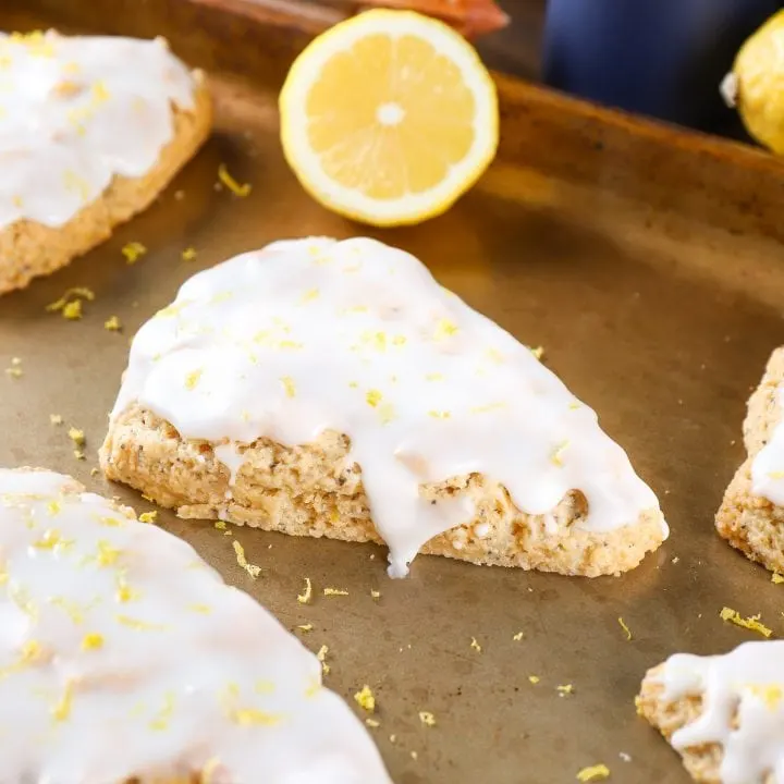 Baking sheet with Lemon Poppy Seed Scones. Recipe from A Kitchen Addiction