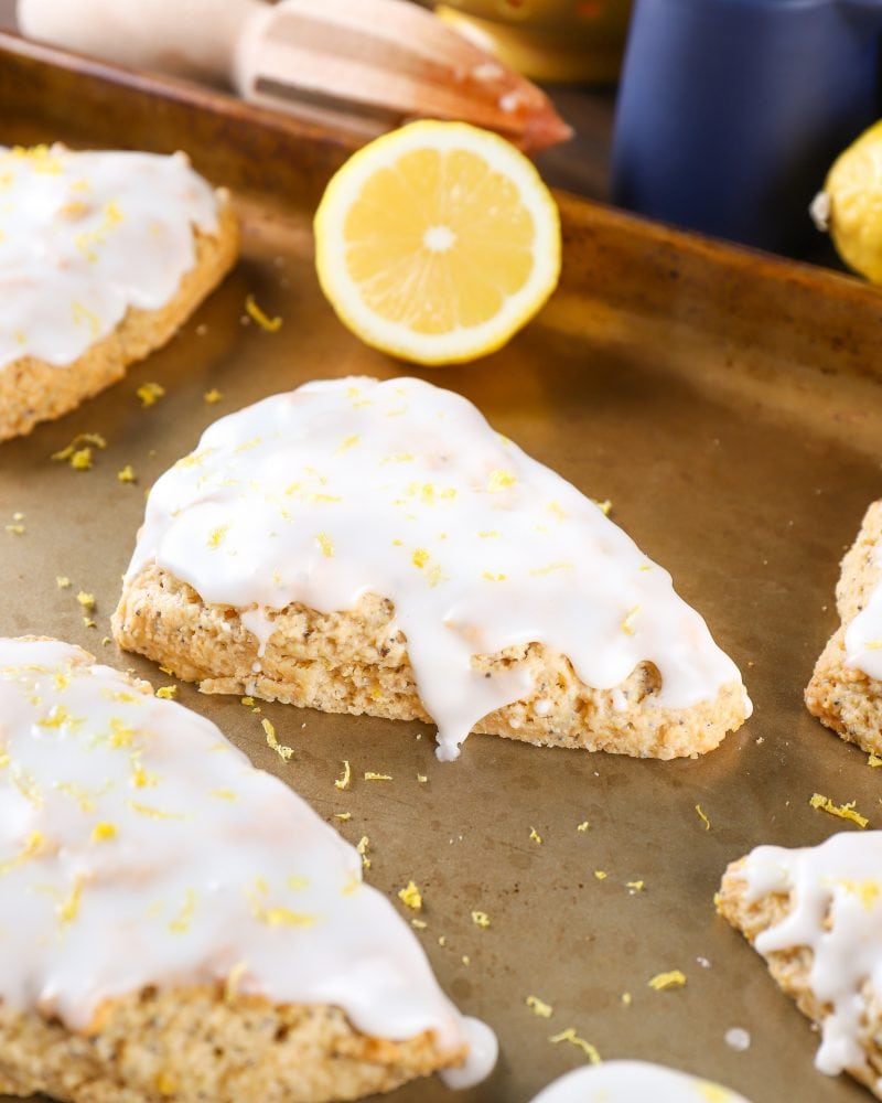 Baking sheet with Lemon Poppy Seed Scones. Recipe from A Kitchen Addiction