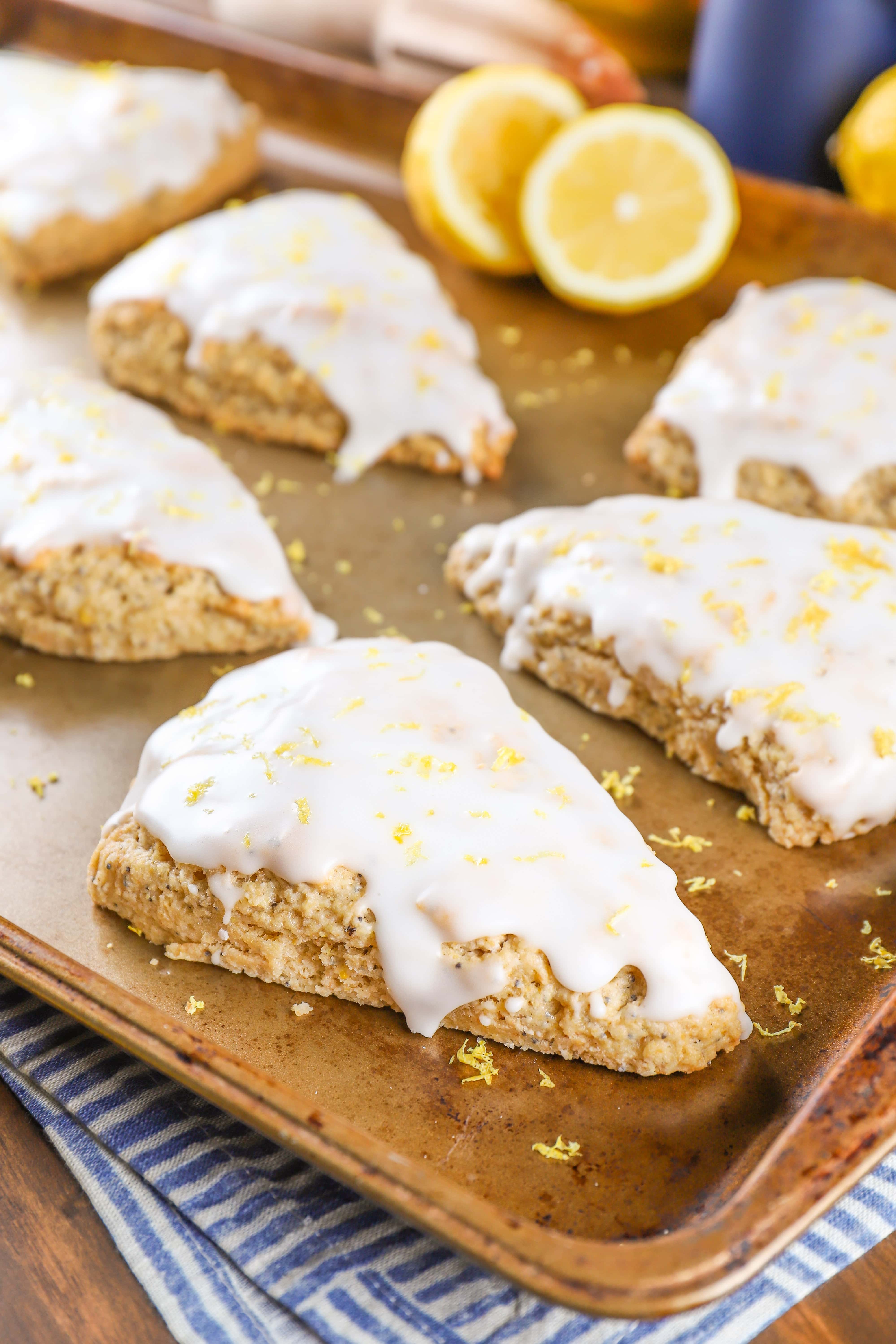 Glazed Lemon Poppy Seed Scone on a baking sheet