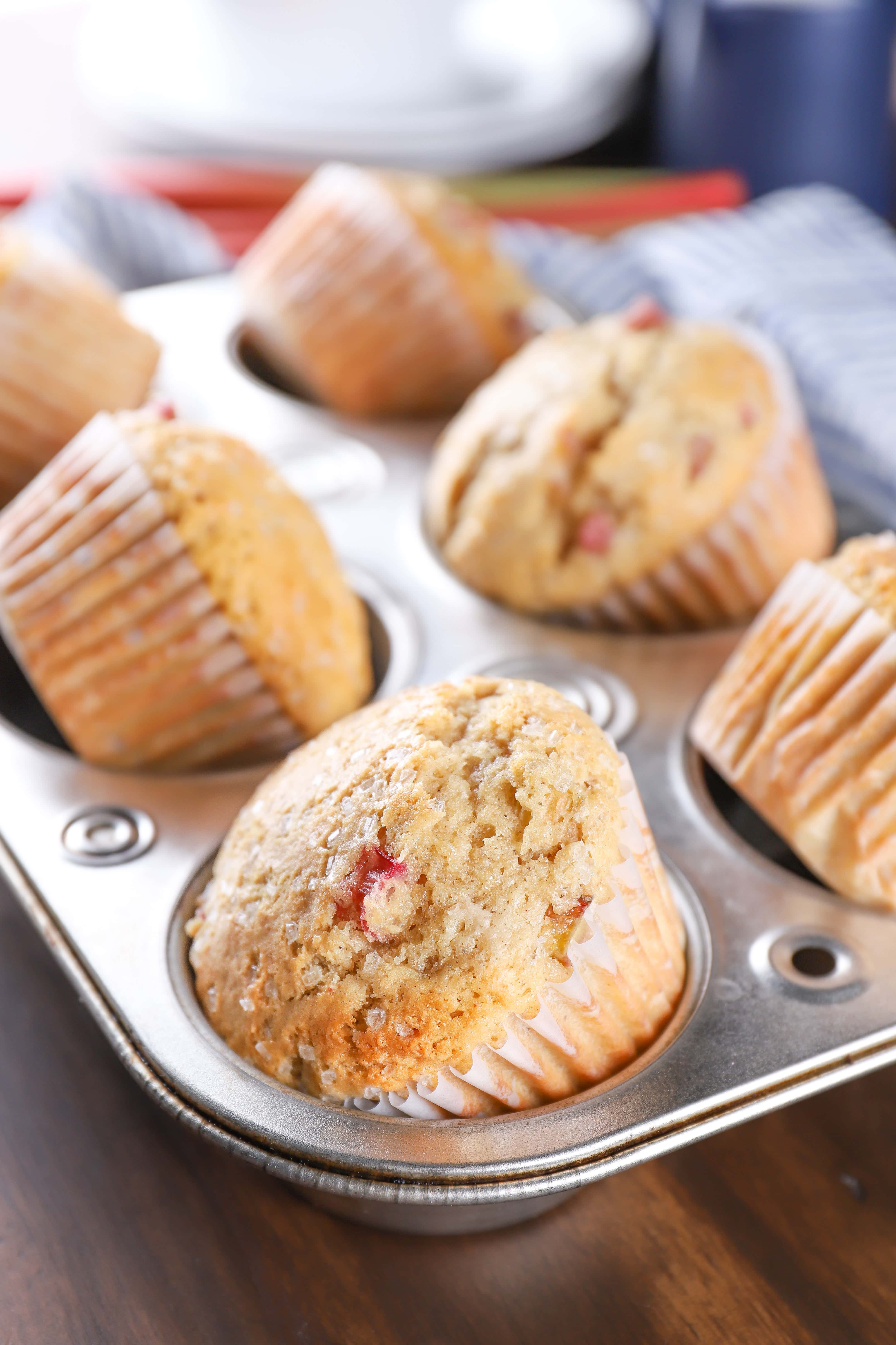 Simple bakery style rhubarb muffins in a muffin tin. Recipe from A Kitchen Addiction