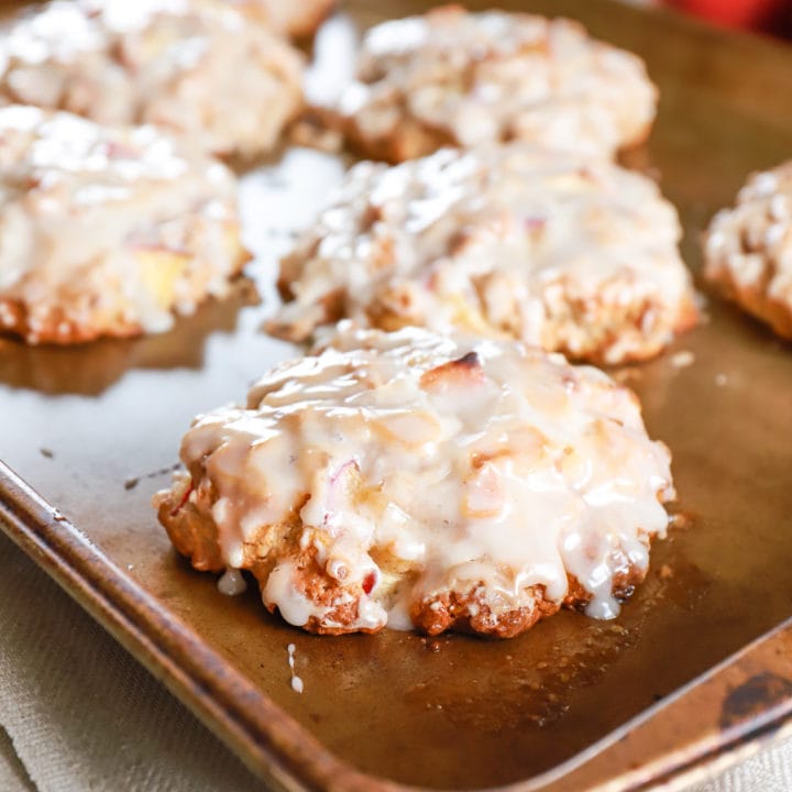 Baked Apple Fritters on a baking sheet. Recipe from A Kitchen Addiction