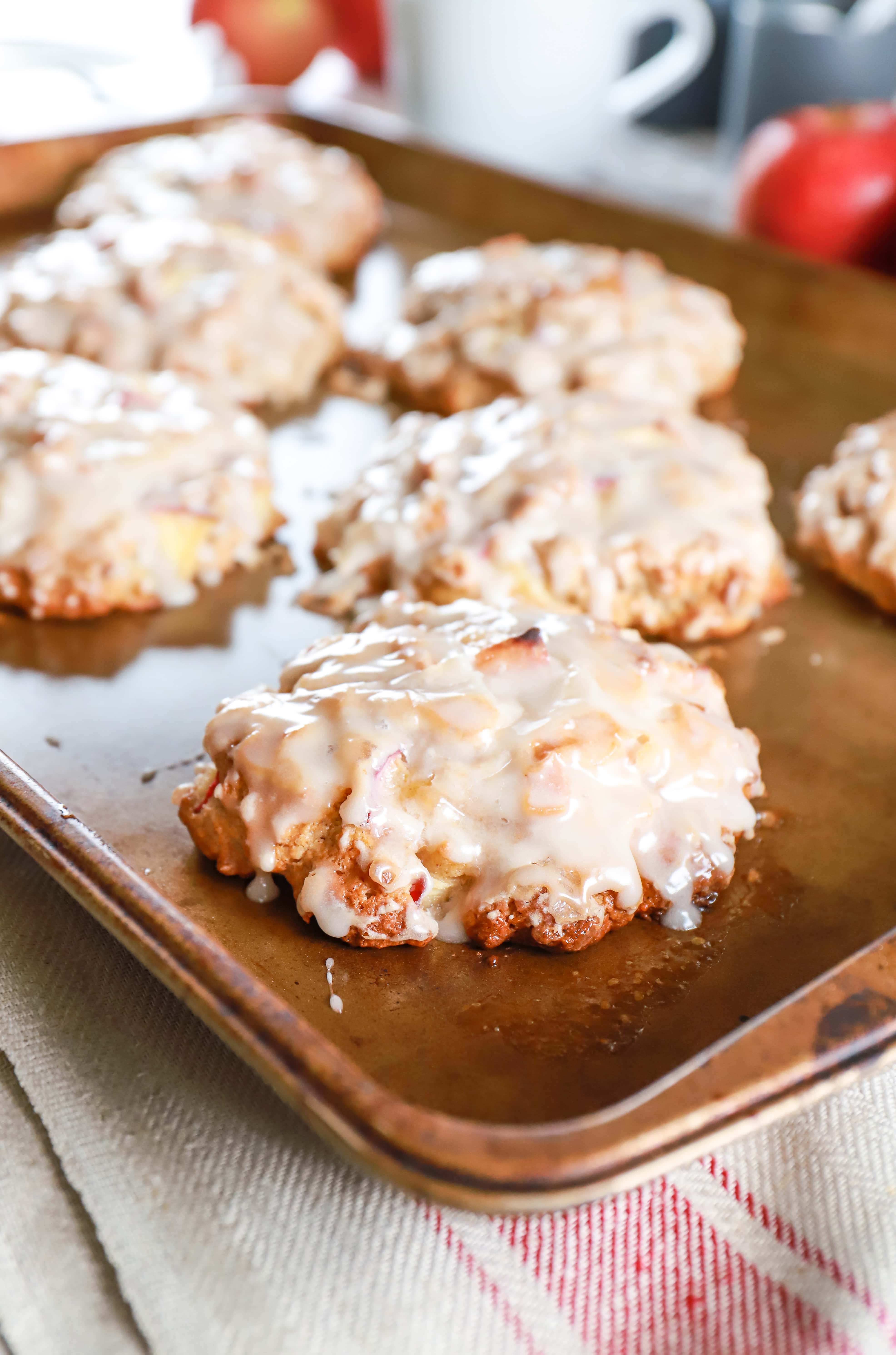 Baked Apple Fritters on a baking sheet. Recipe from A Kitchen Addiction