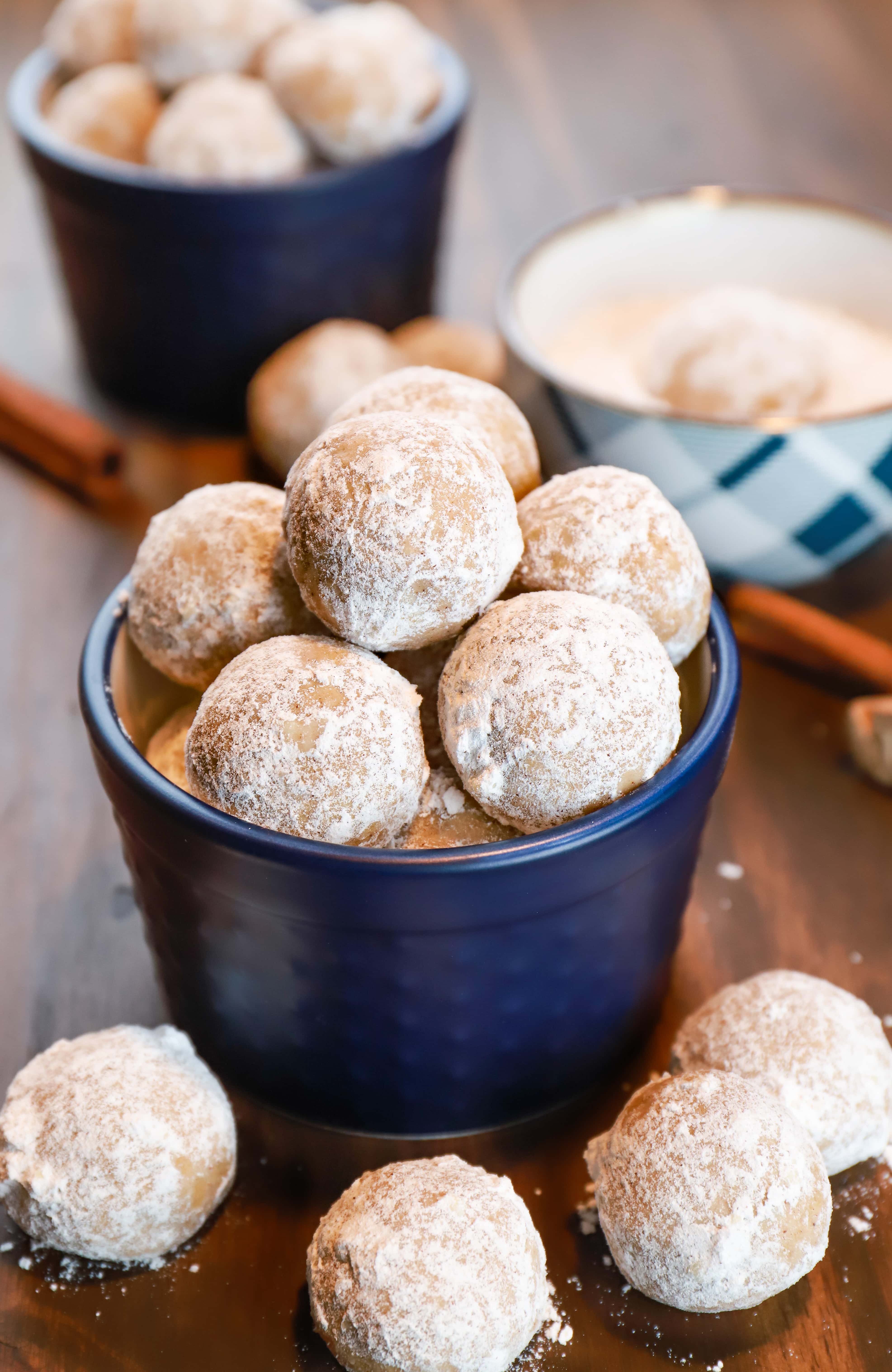 Gingerbread snowball cookies in a blue dish. Recipe from A Kitchen Addiction