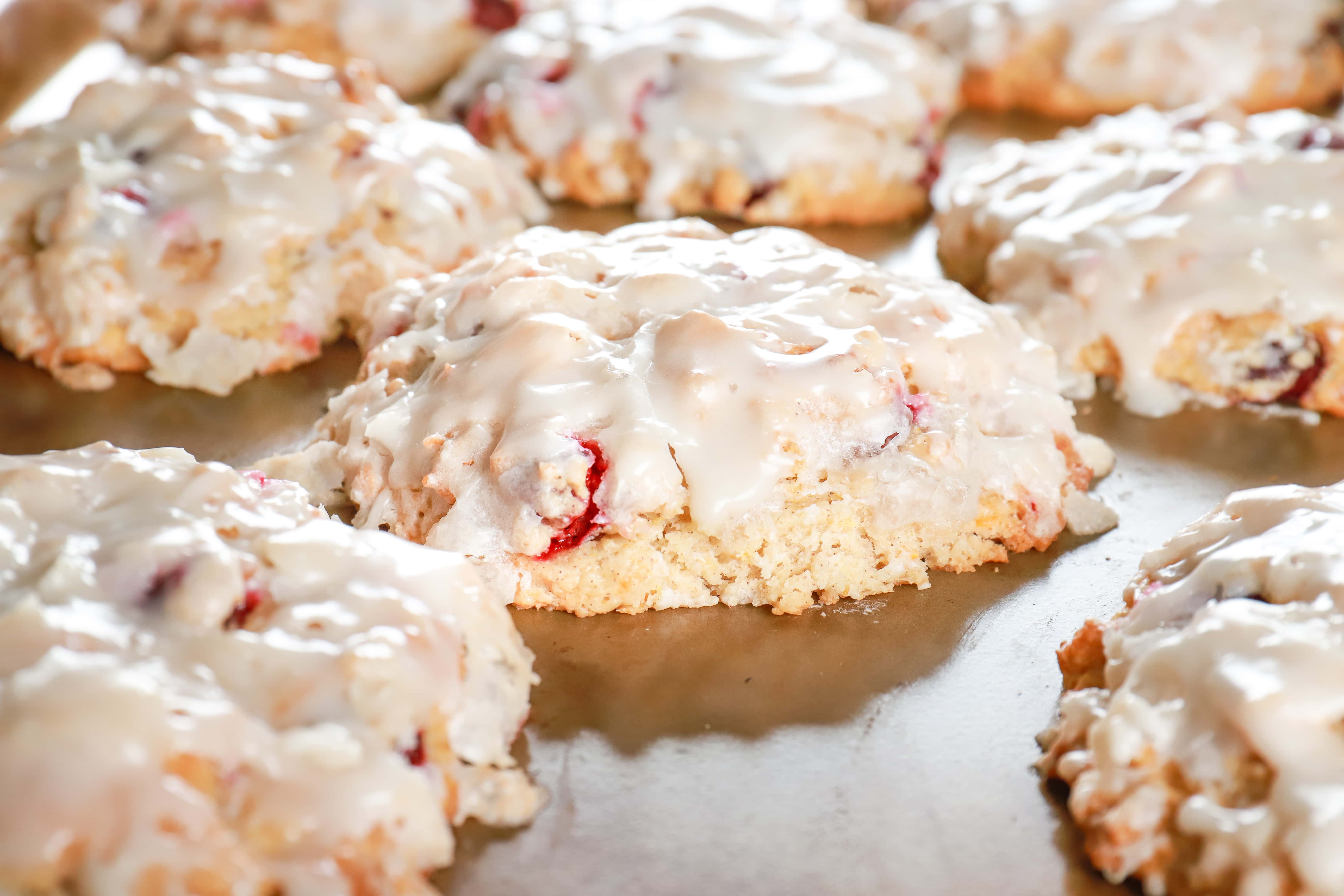 Up close view of the side of a baked cranberry orange fritter. Recipe from A Kitchen Addiction