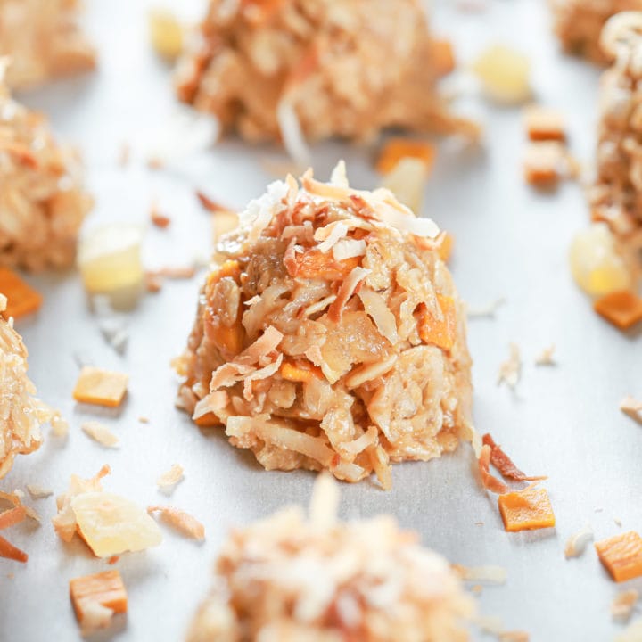 Up close view of a tropical no bake cookie filled with pineapple, mango, and coconut.