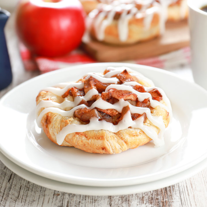 apple cream cheese danish on a small white plate