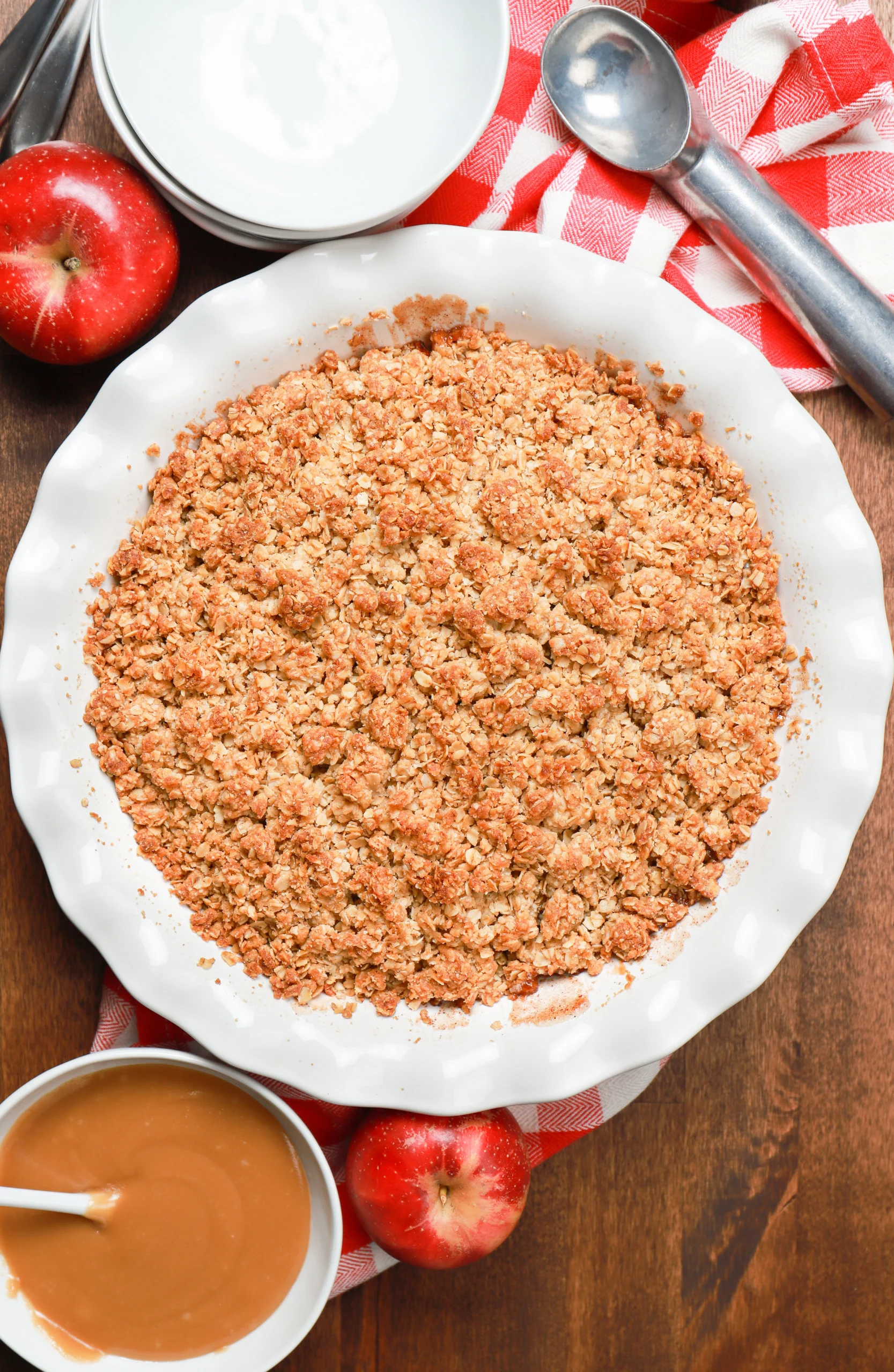 Overhead view of the caramel apple crisp cooling on a wire rack.